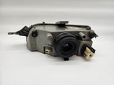 Main headlight right with leveling control - signs of wear - Hella FIAT