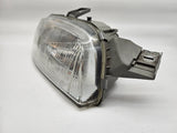 Main headlight right with leveling control - signs of wear - Hella FIAT