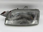 Original Fiat Punto I headlight left 46481414 / 39770381