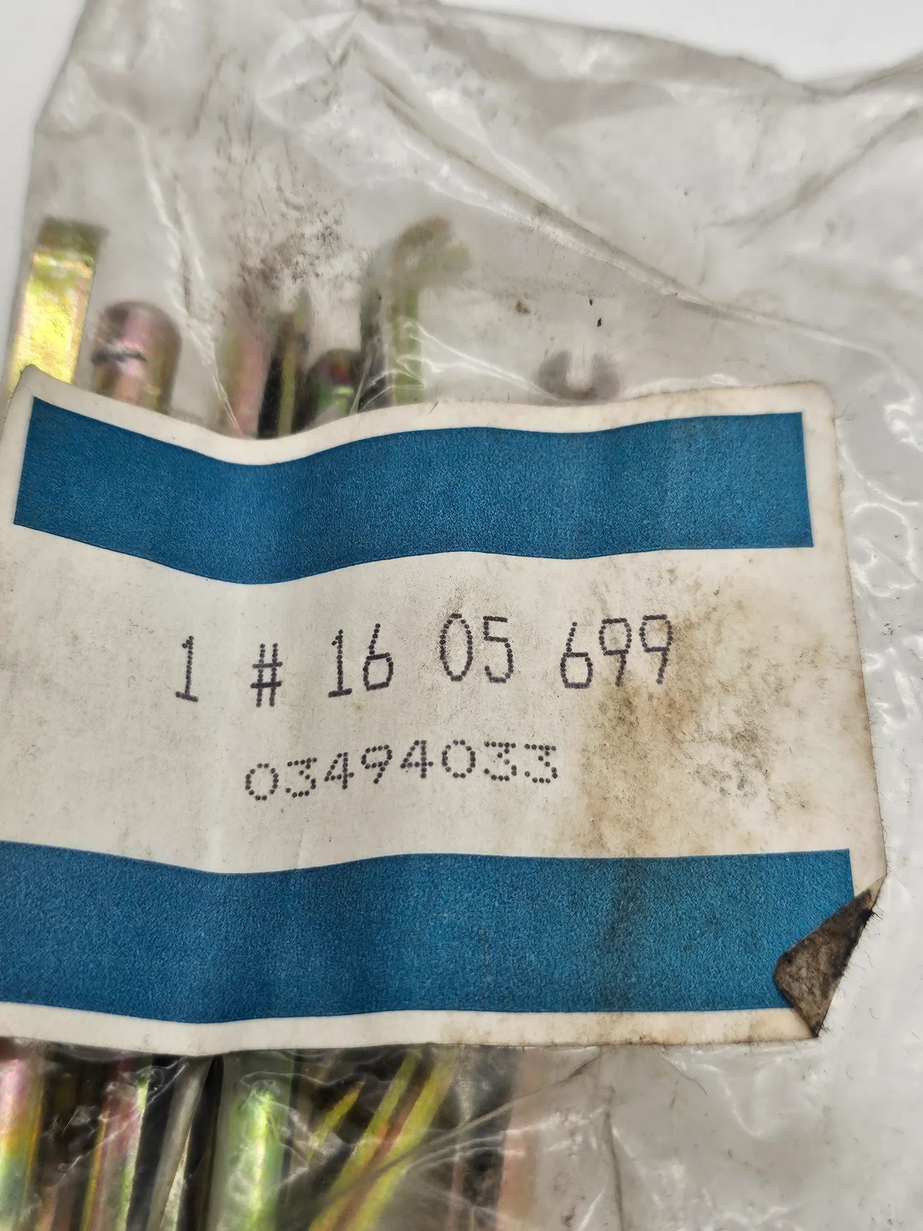 Оригинальный комплект тормозных колодок Opel GM 1605699 03494033