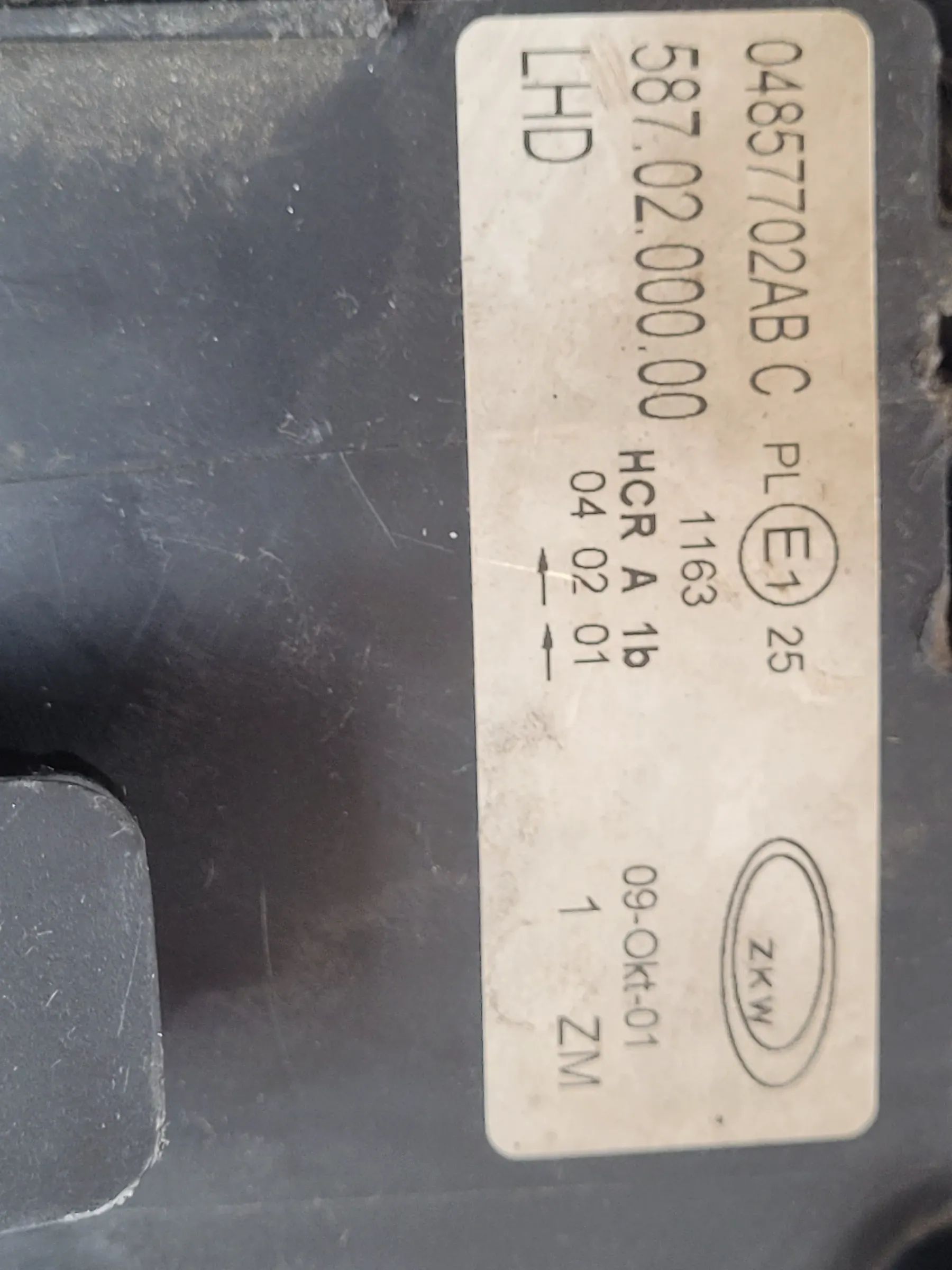 Original Chrysler Voyager IV 4 (RG/RS) Frontscheinwerfer Rechts, 04857702AB