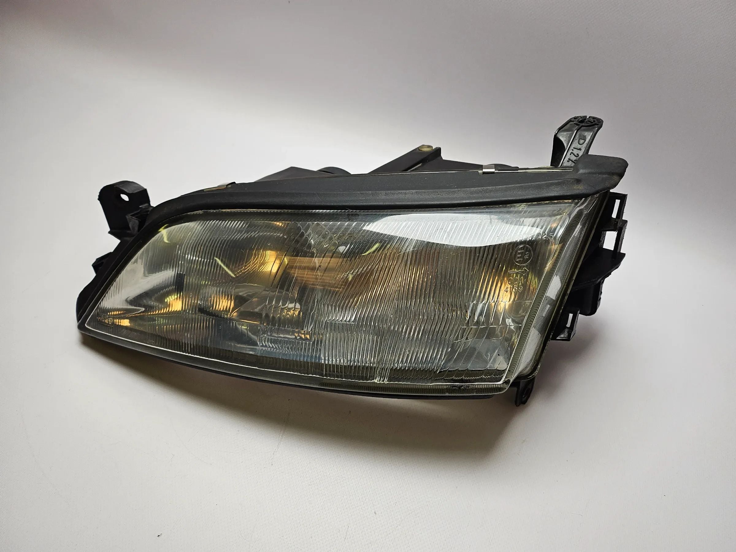 Óptica izquierda original Opel Vectra B ´97, Valeo con regulación de altura 88201726