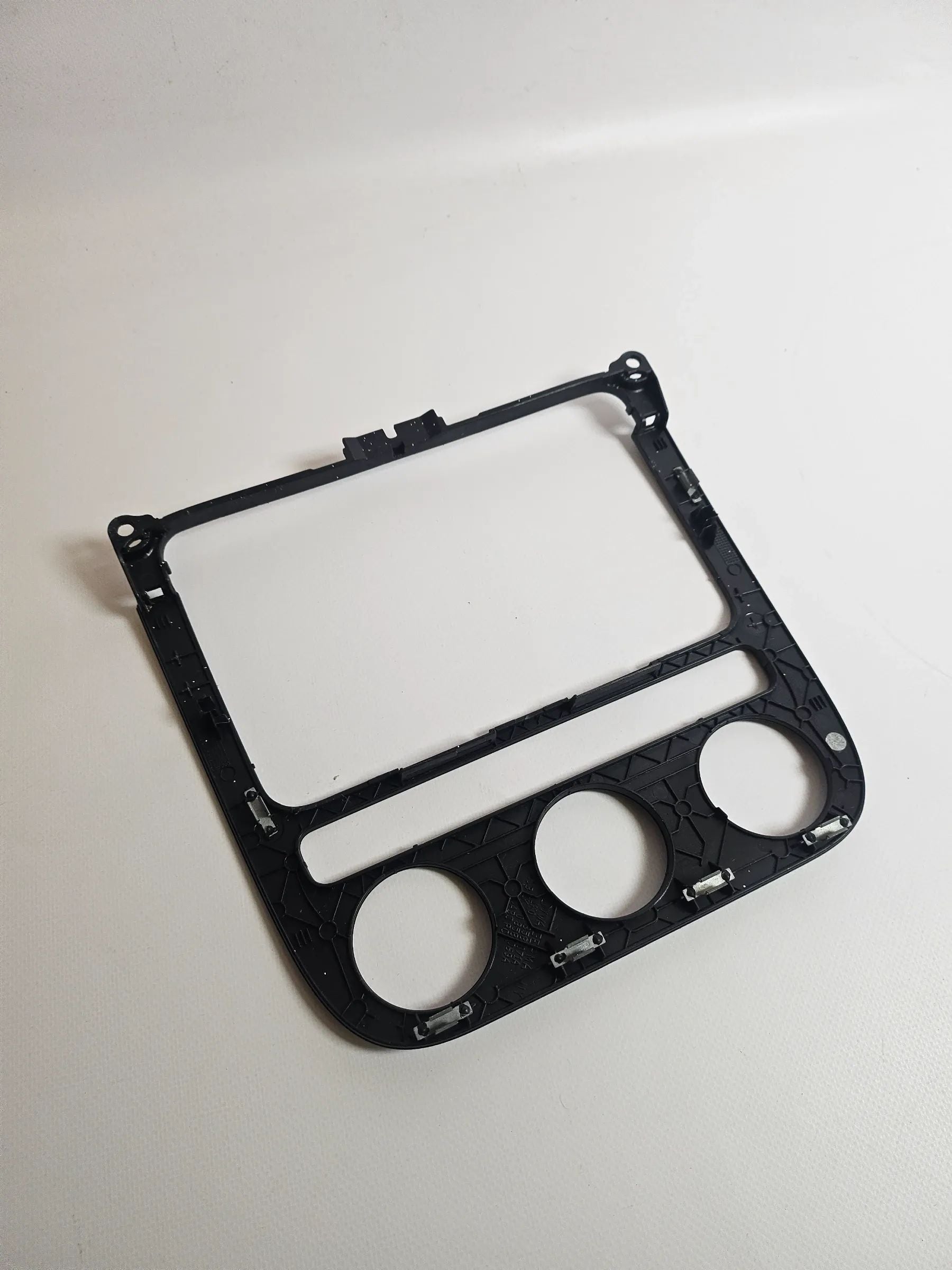 Oryginalna osłona konsoli środkowej radia i ogrzewania VW Golf V 1K 1K0858071A
