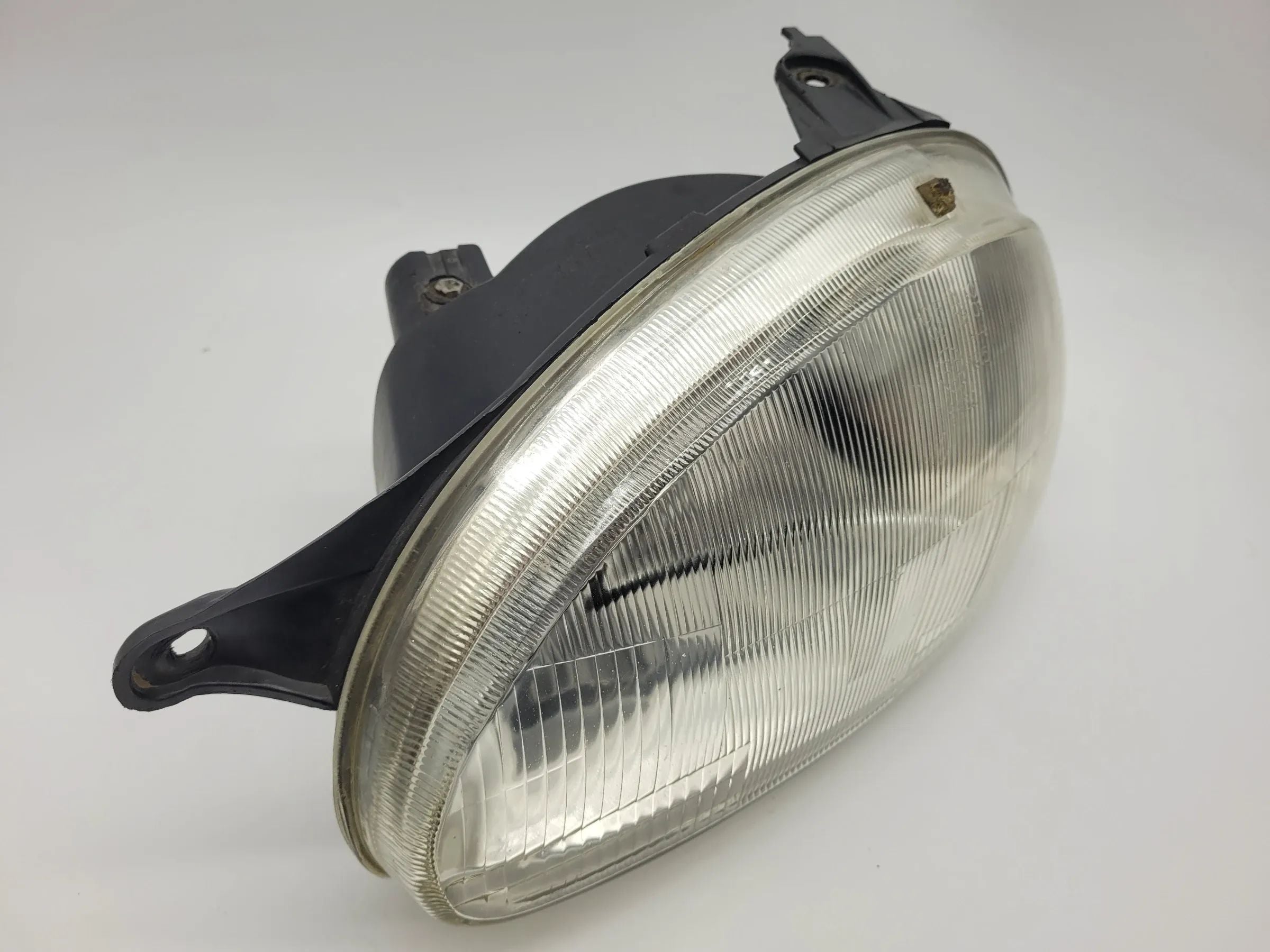 Opel Corsa B (S93) Scheinwerfer / Frontleuchte Links 20-3204 (90444784)