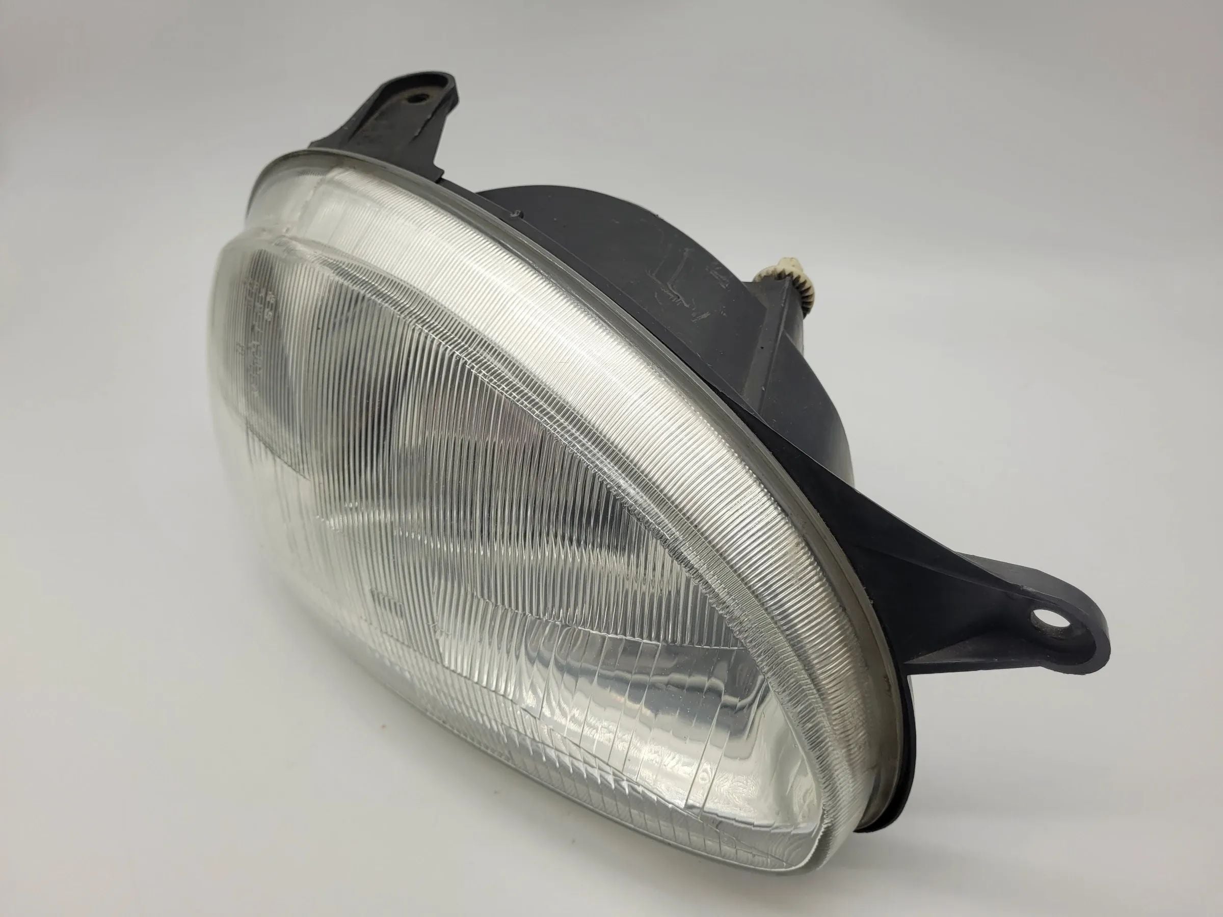 Original Opel Corsa B (S93) Scheinwerfer / Frontleuchte Rechts Hella 90444785