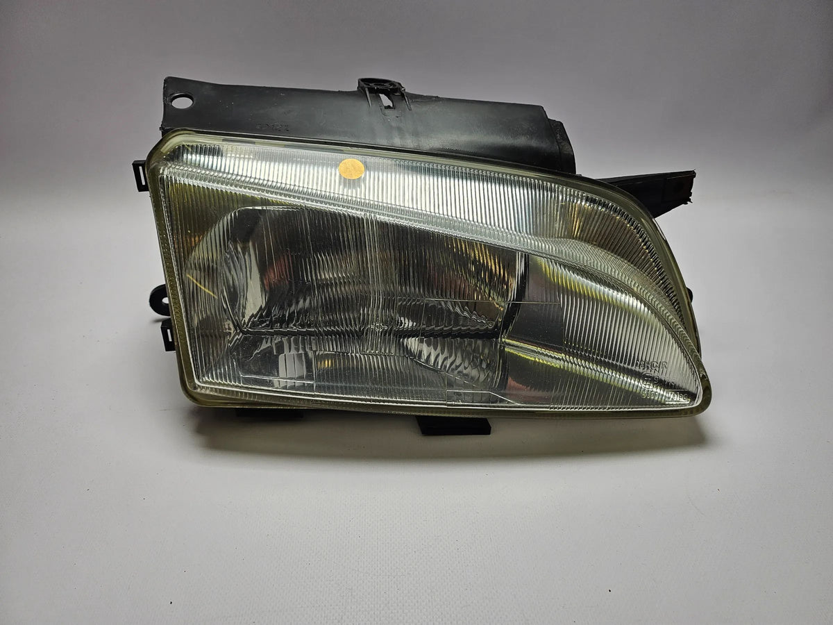 Original Peugeot Partner 1996 headlight right with LWR 