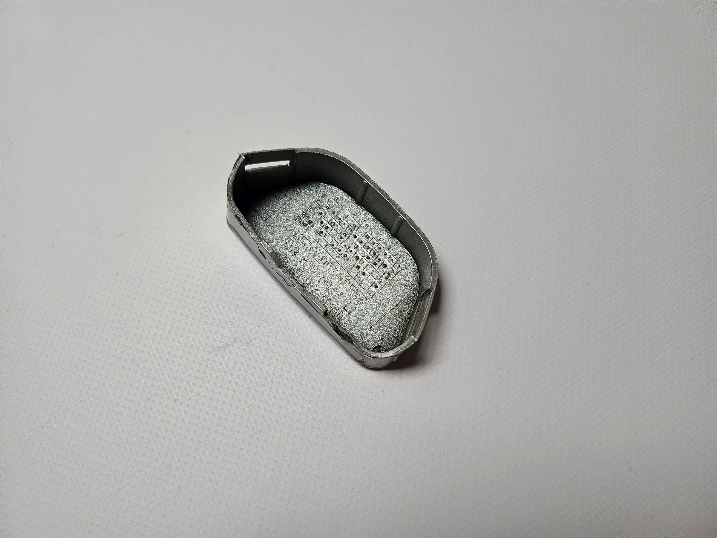 Original Mercedes W210 Klappe / Deckel Düse SWA linkls  silber A2108260977