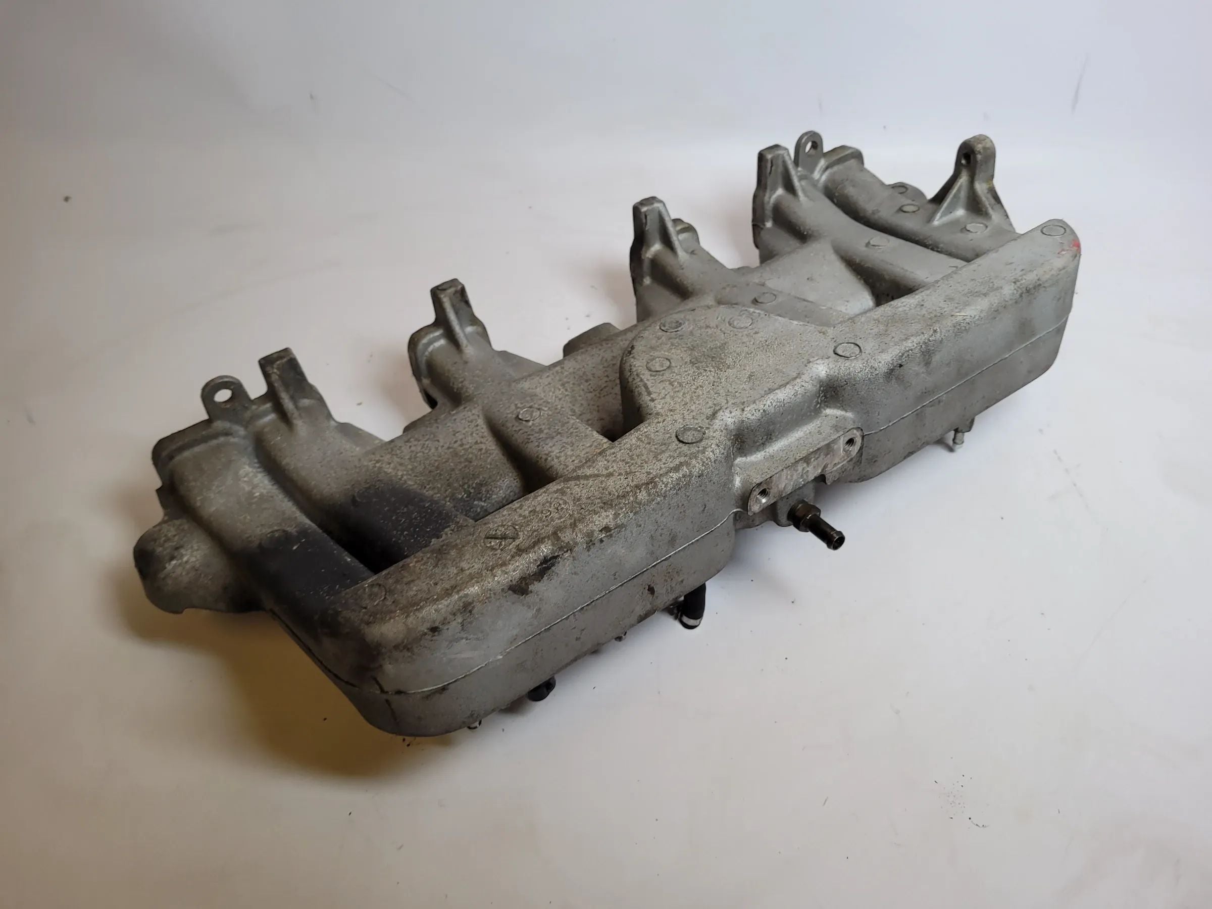 Jeep Cherokee / Wrangler 2 XJ/TJ Ansaugbrücke Ansaugkrümmer 33007067 Original