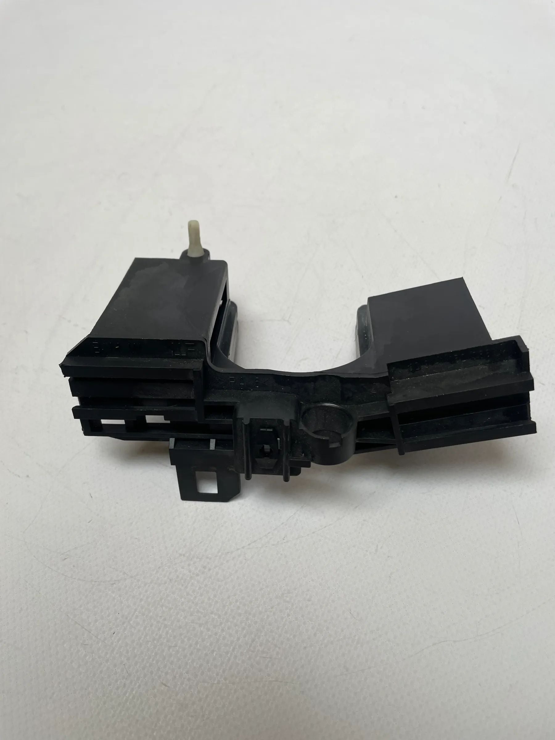 Oryginalny BMW 5er (E39) uchwyt przełącznika kolumny kierownicy 1162088