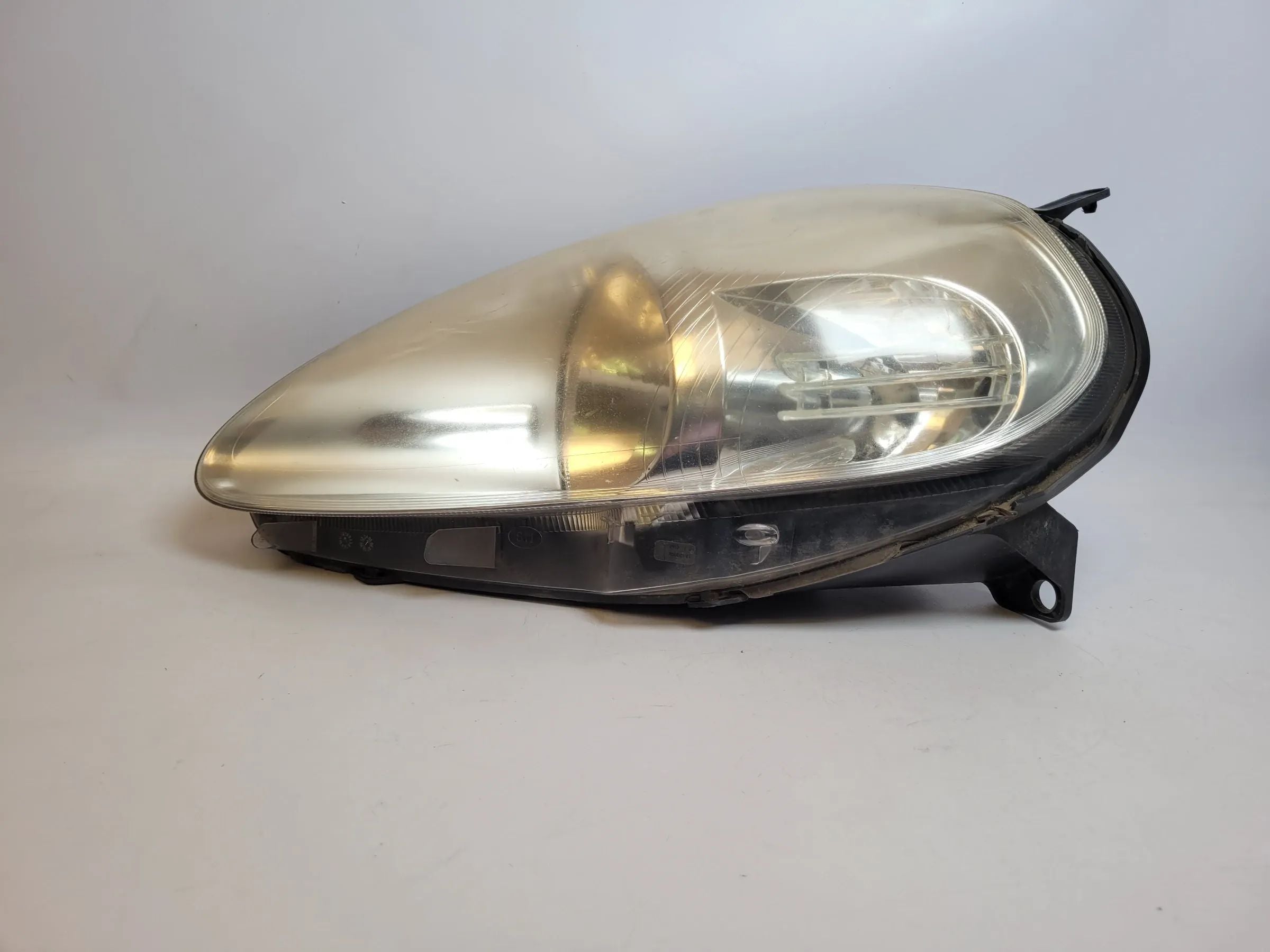 Original Fiat Punto Grande (199) Scheinwerfer/Frontleuchte Links 89101387