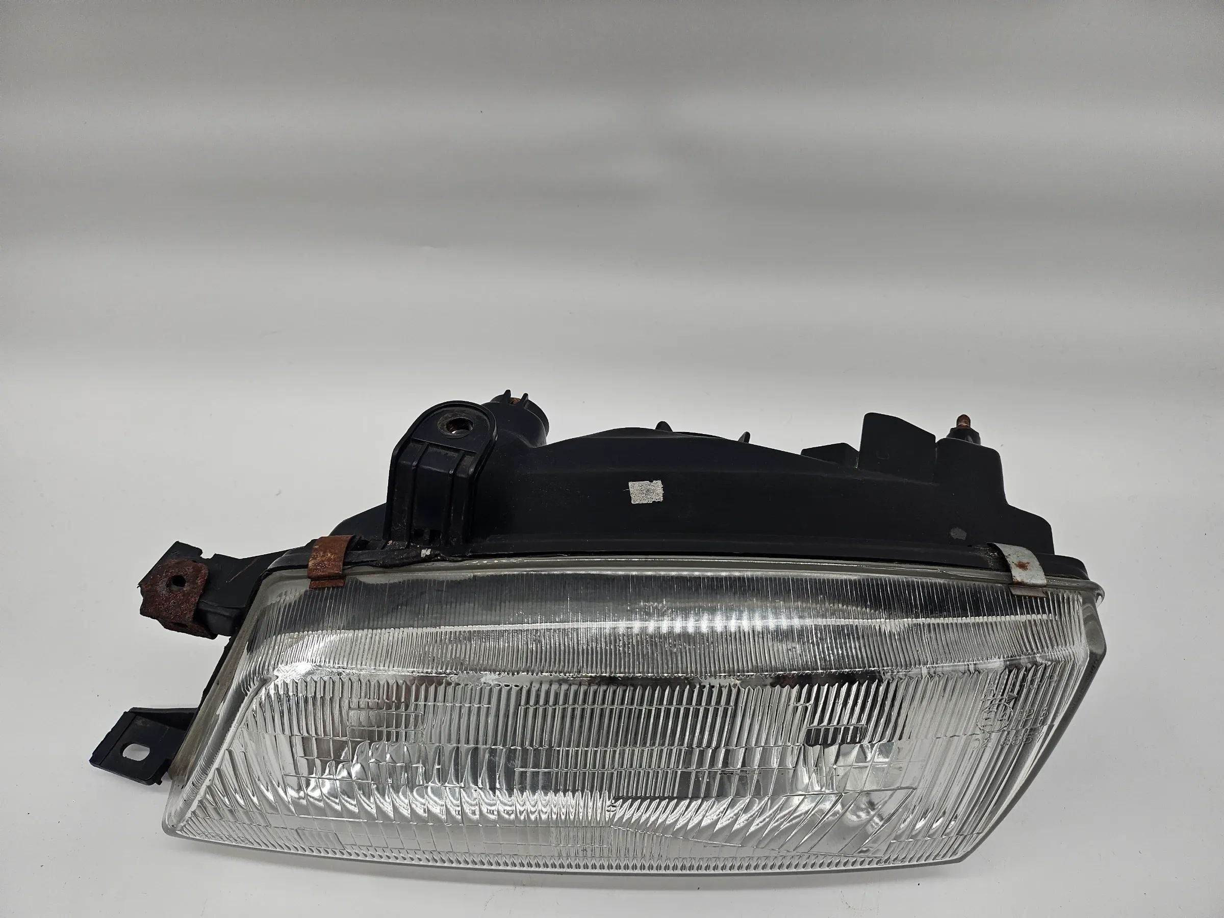 Headlight left Suzuki EG Baleno 1.3 with LWR