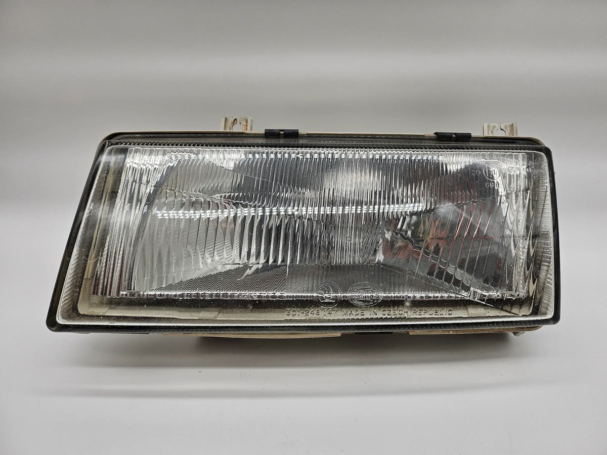 originele Hella Skoda Felicia koplamp voor links 246149-00