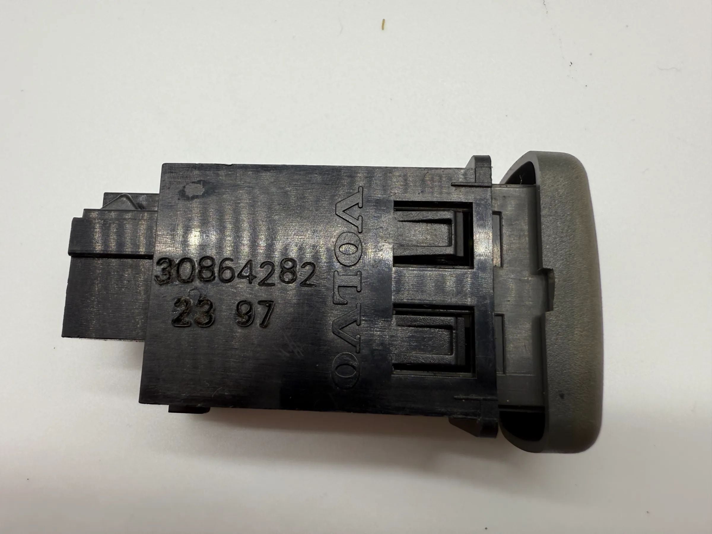 Oryginalny przełącznik Volvo V40 S40 S "Inny" Lewy Przedni TRW 30864282