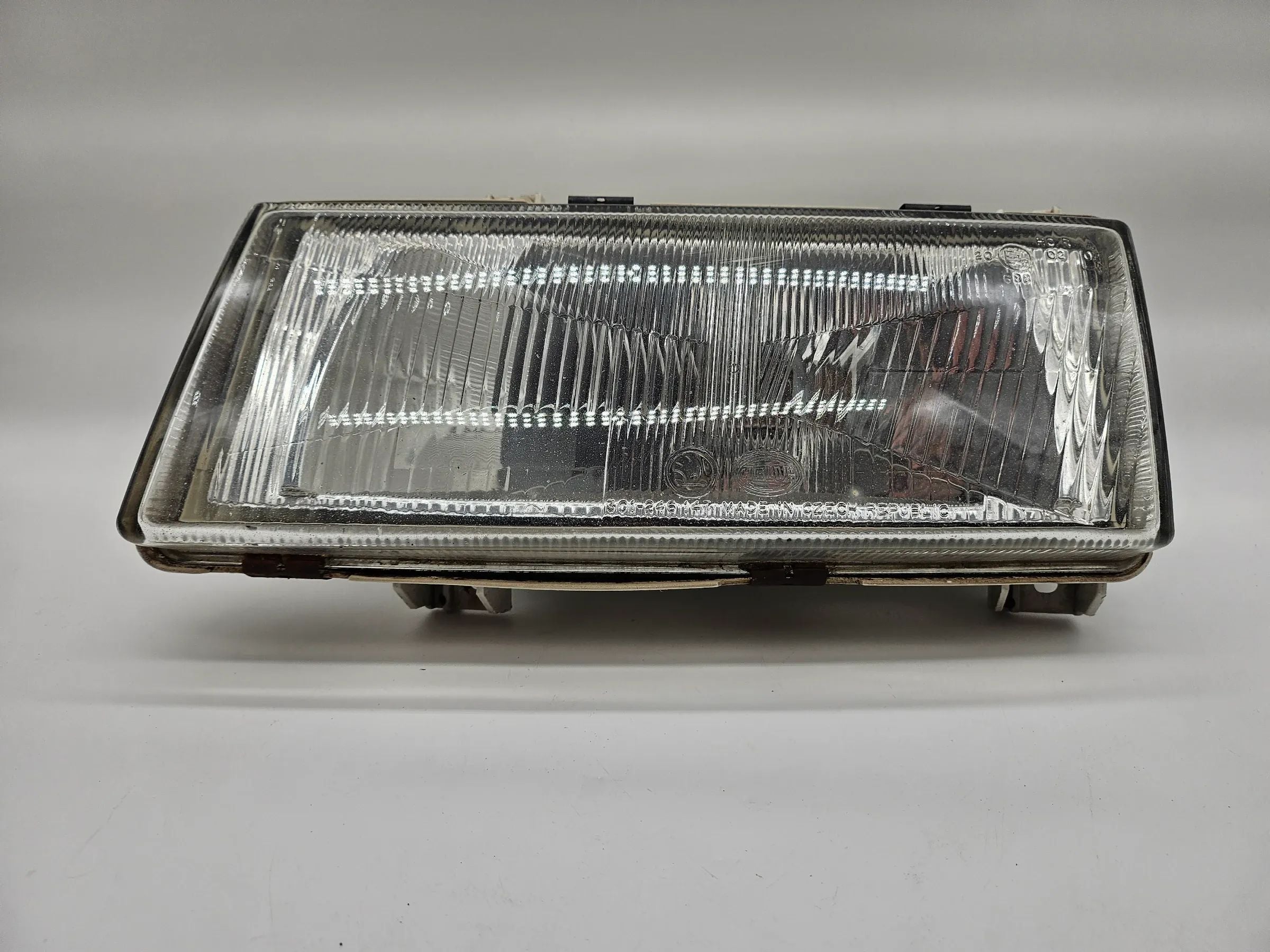 originele Hella Skoda Felicia koplamp voor links 246149-00