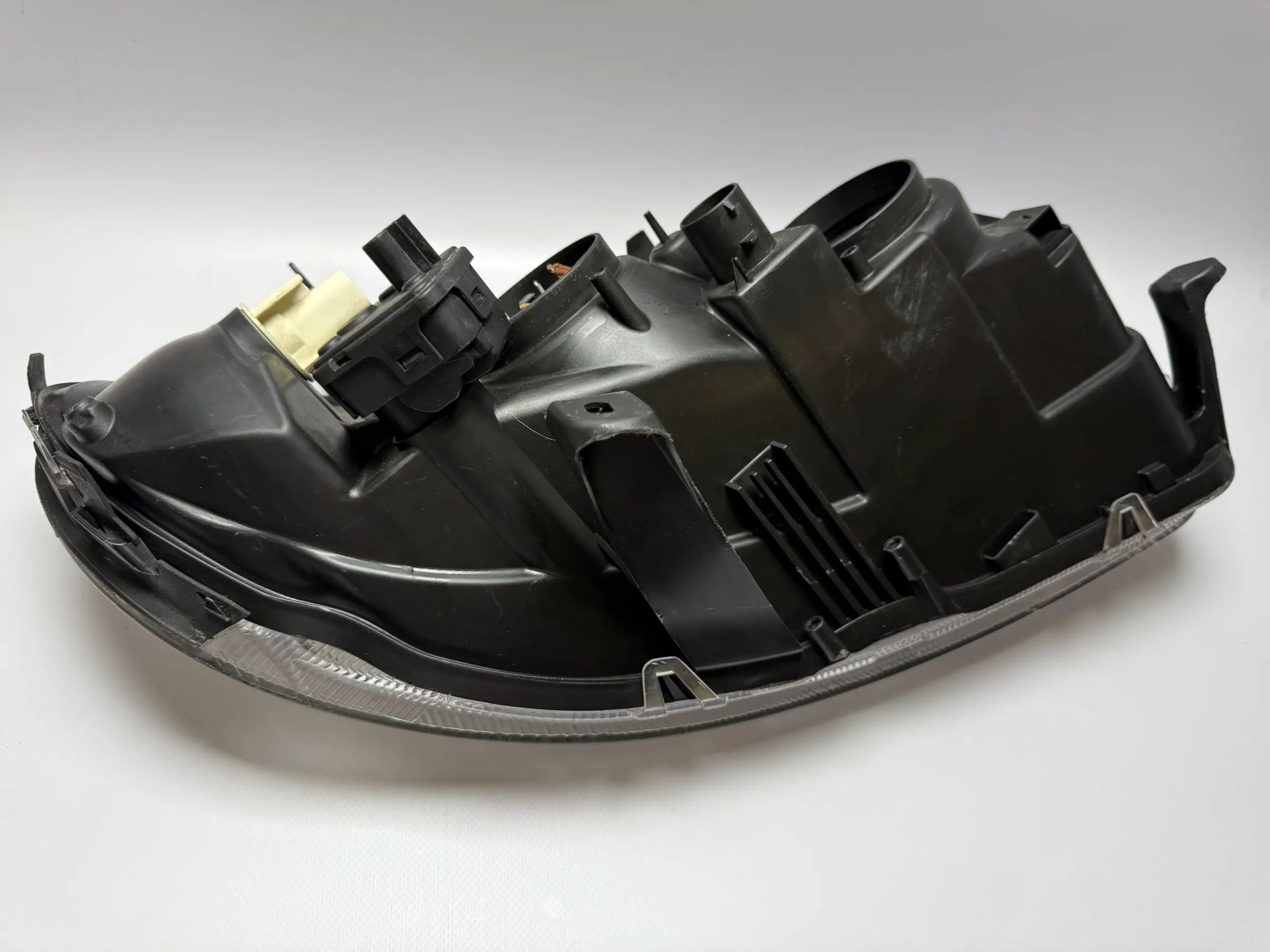 Ópticas dianteiras principais originais Opel Omega B1 1998 com ajuste faróis à esquerda Hella 15443500