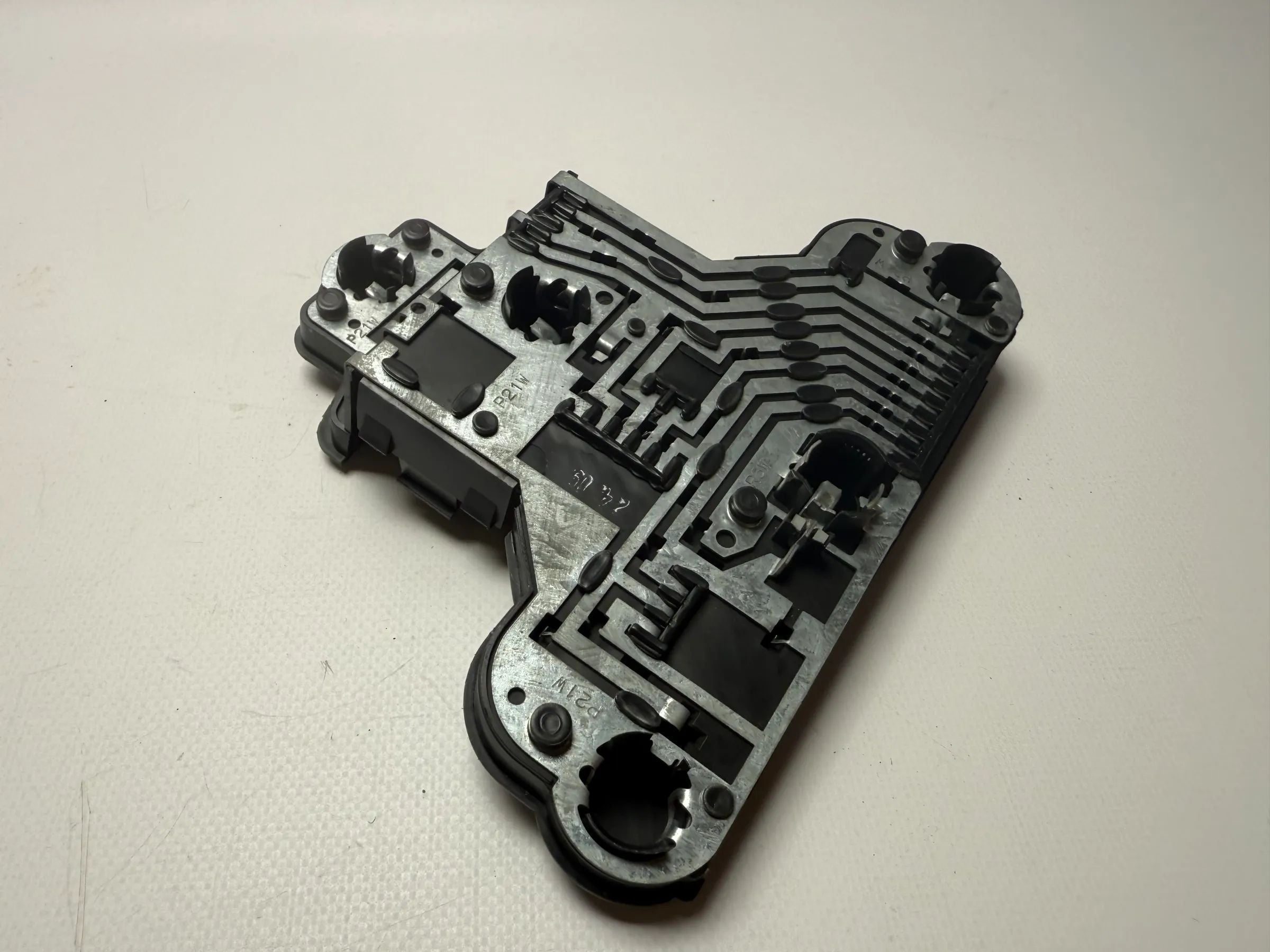 Оригинальный держатель лампы заднего фонаря VW Гольф 3 (VR6 GTI) 1H6 945 257