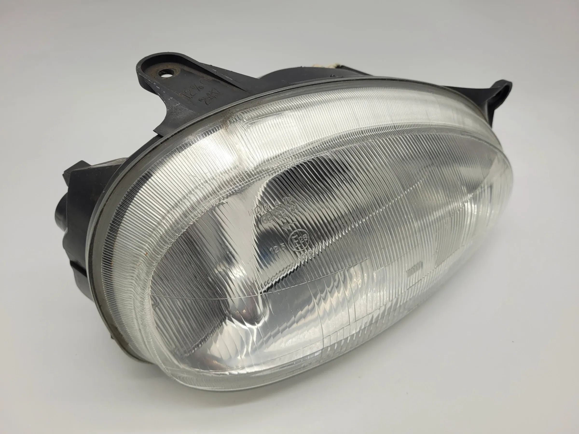 Original Opel Corsa B (S93) Scheinwerfer / Frontleuchte Rechts Hella 90444785