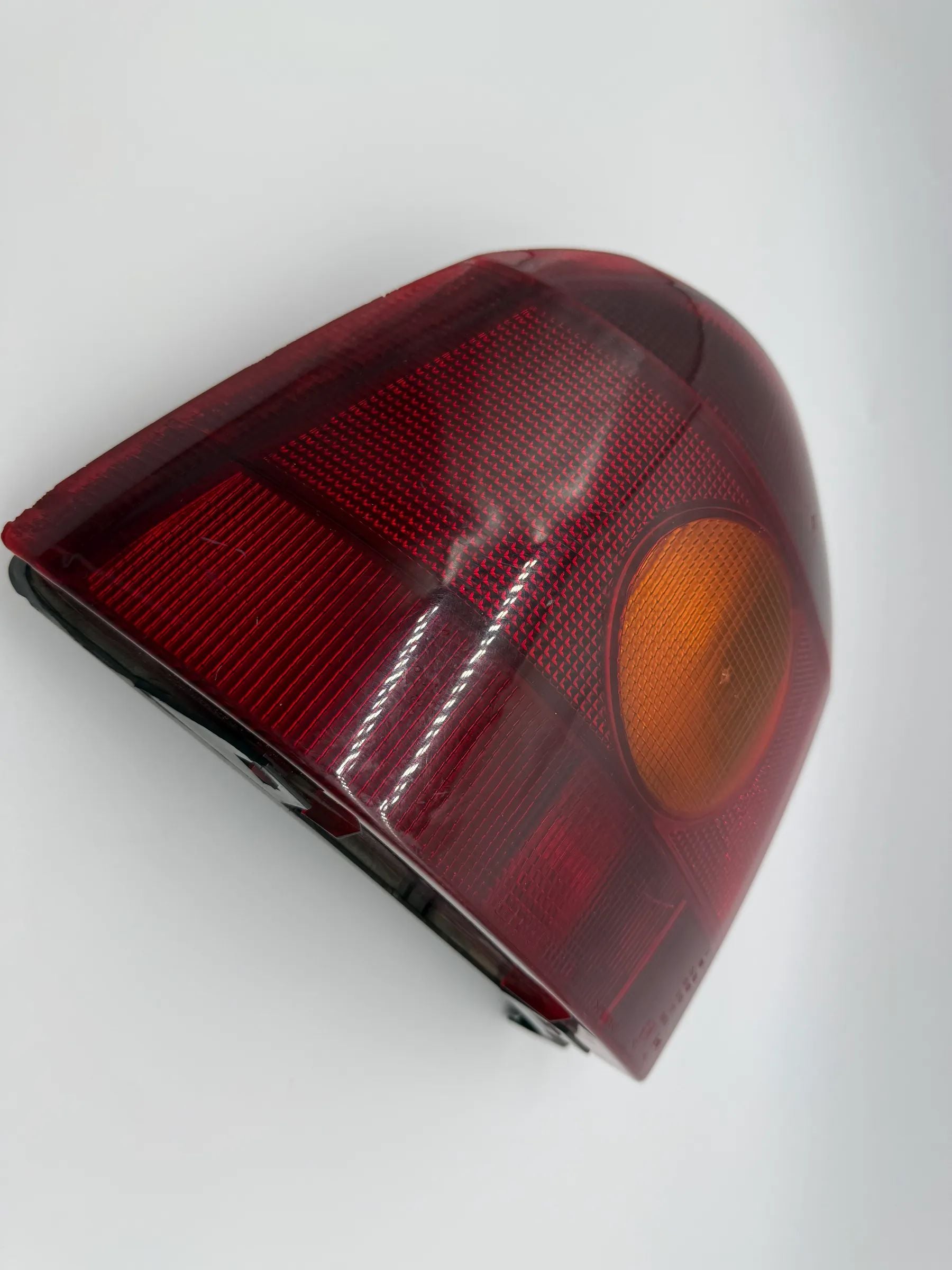 Original Renault Twingo I (C06) rear light left Carello 7700820013 
