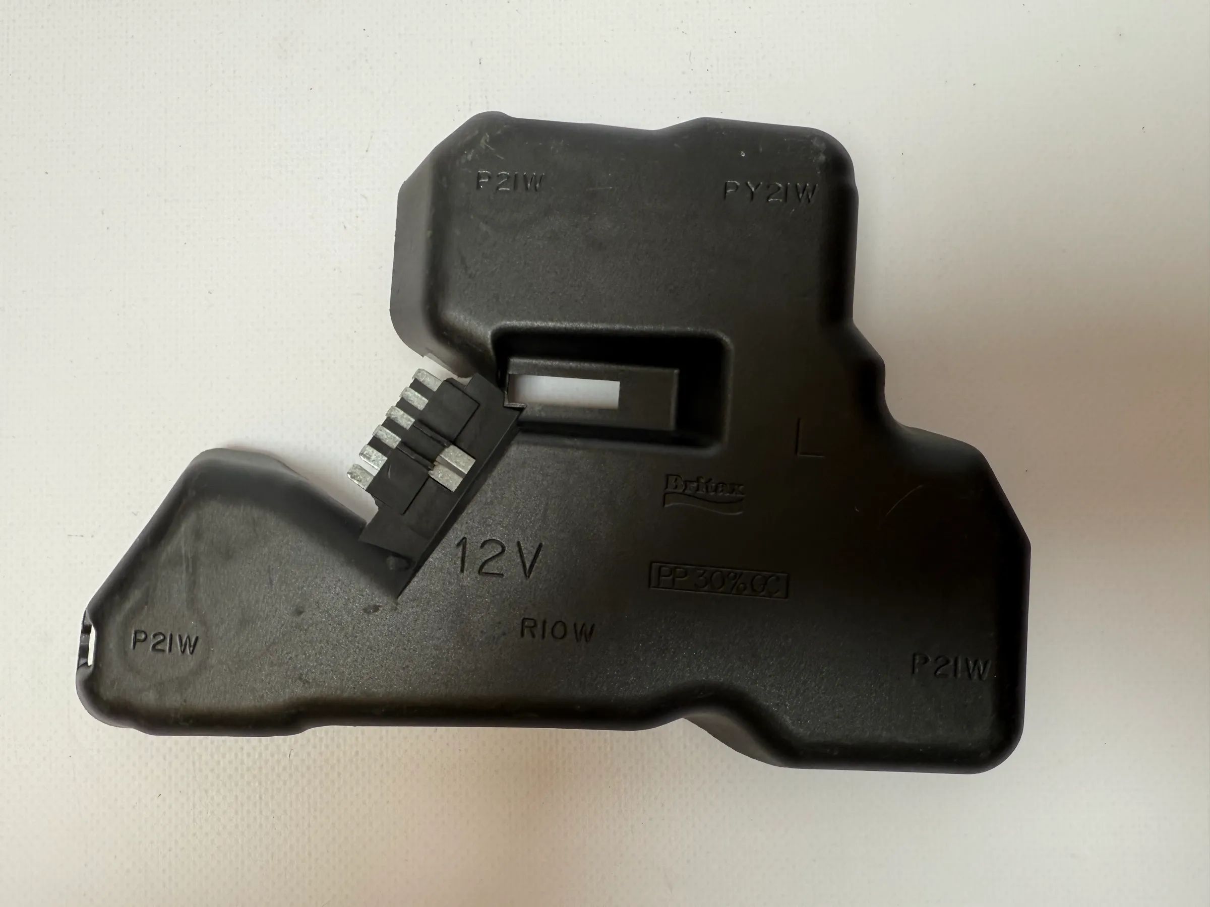 Oryginalny mocownik lampy tylnej lewy Rover 200 / 25 (RF) Britax RIOW