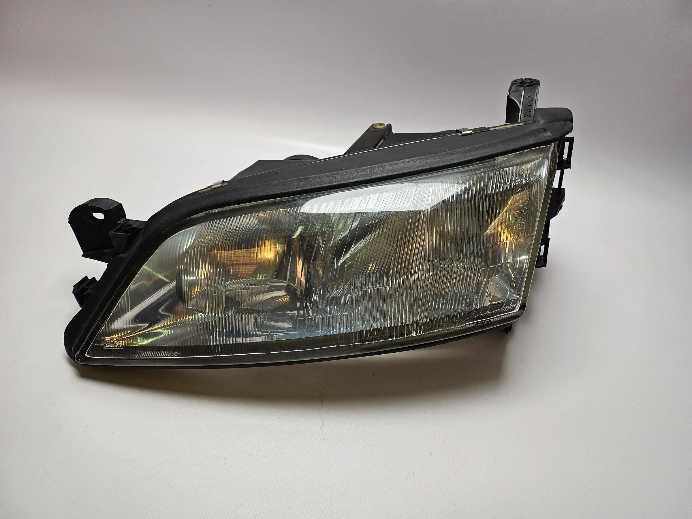 Óptica izquierda original Opel Vectra B ´97, Valeo con regulación de altura 88201726