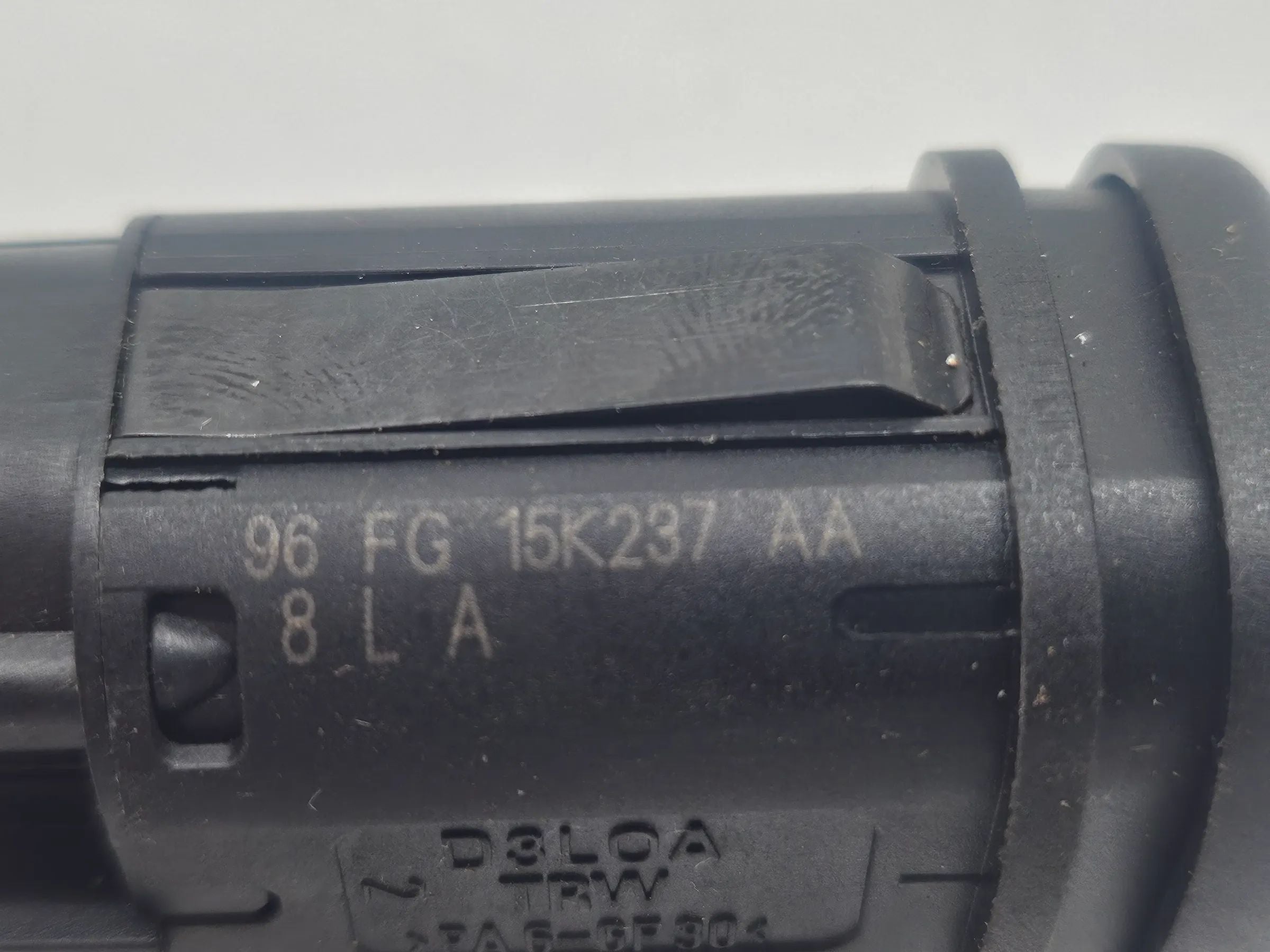 Oryginalna tylna lampa przeciwmgielna Ford Fiesta Puma 96FG15K237AA, TRW