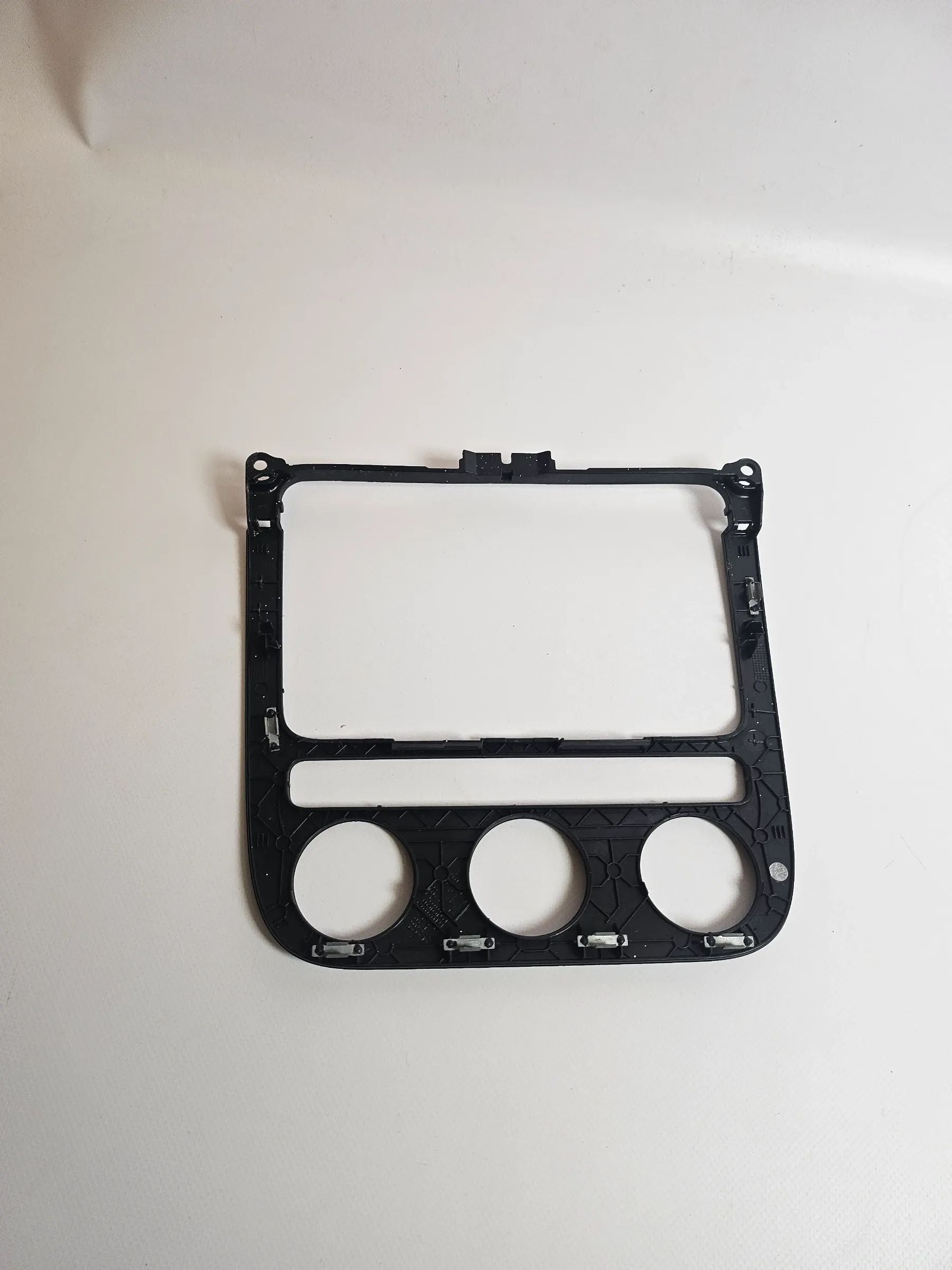 Oryginalna osłona konsoli środkowej radia i ogrzewania VW Golf V 1K 1K0858071A
