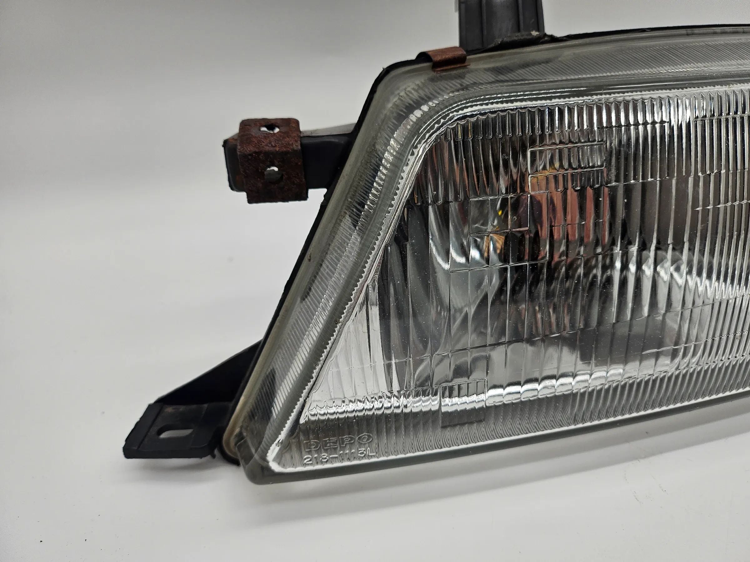 Headlight left Suzuki EG Baleno 1.3 with LWR