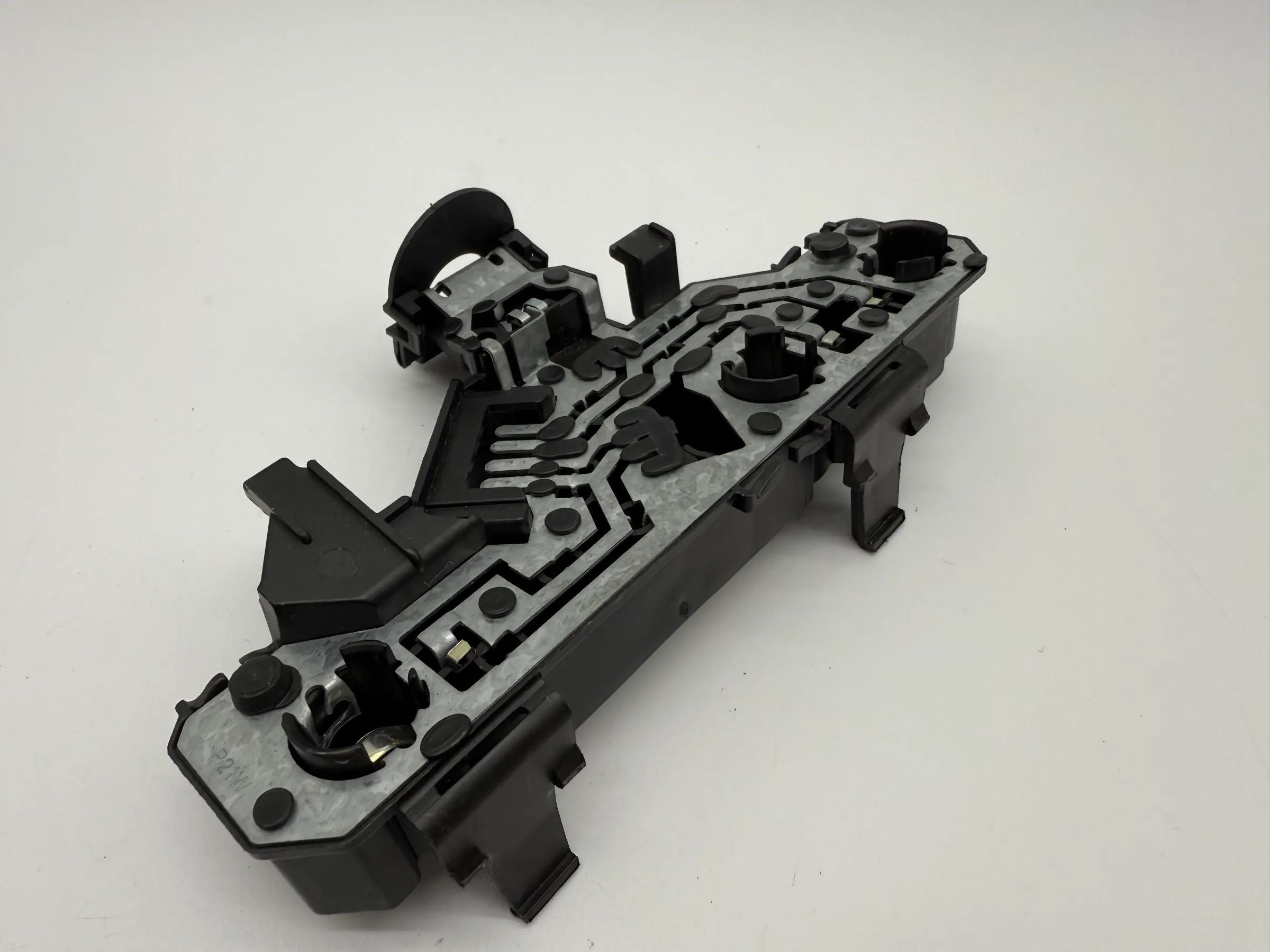 Oryginalny uchwyt lampy tylnej VW Polo 6N/6KV lewy 6N0 945 257 / 962 565