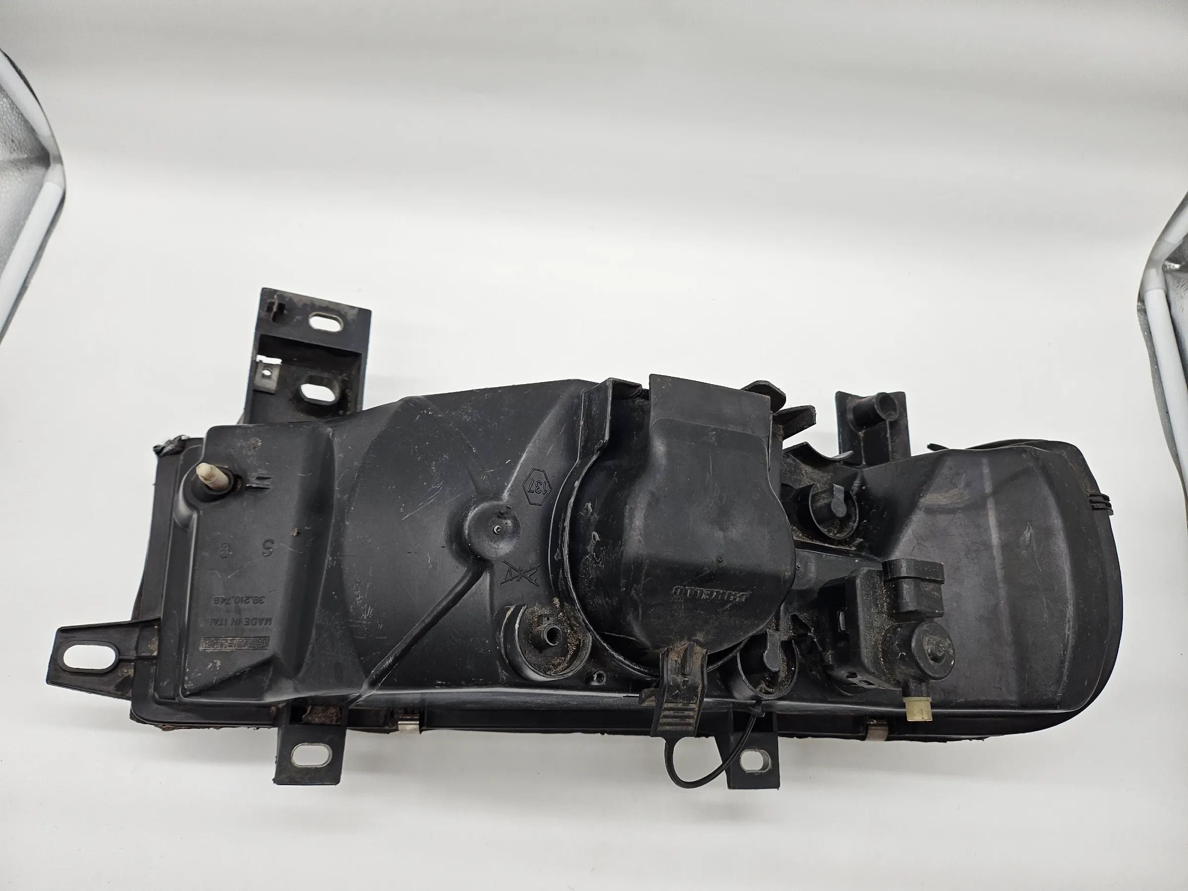 7701044518F SUPPORT DE PHARE GAUCHE / 88886 POUR NISSAN INTERSTAR X70 *
