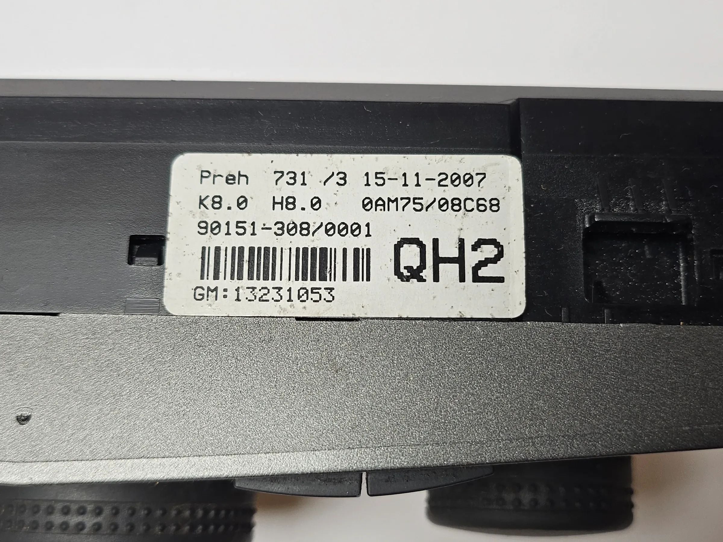 Oryginalny panel klimatyzacji Opel Zafira B element sterujący ogrzewaniem wentylacją 13231053 QH2