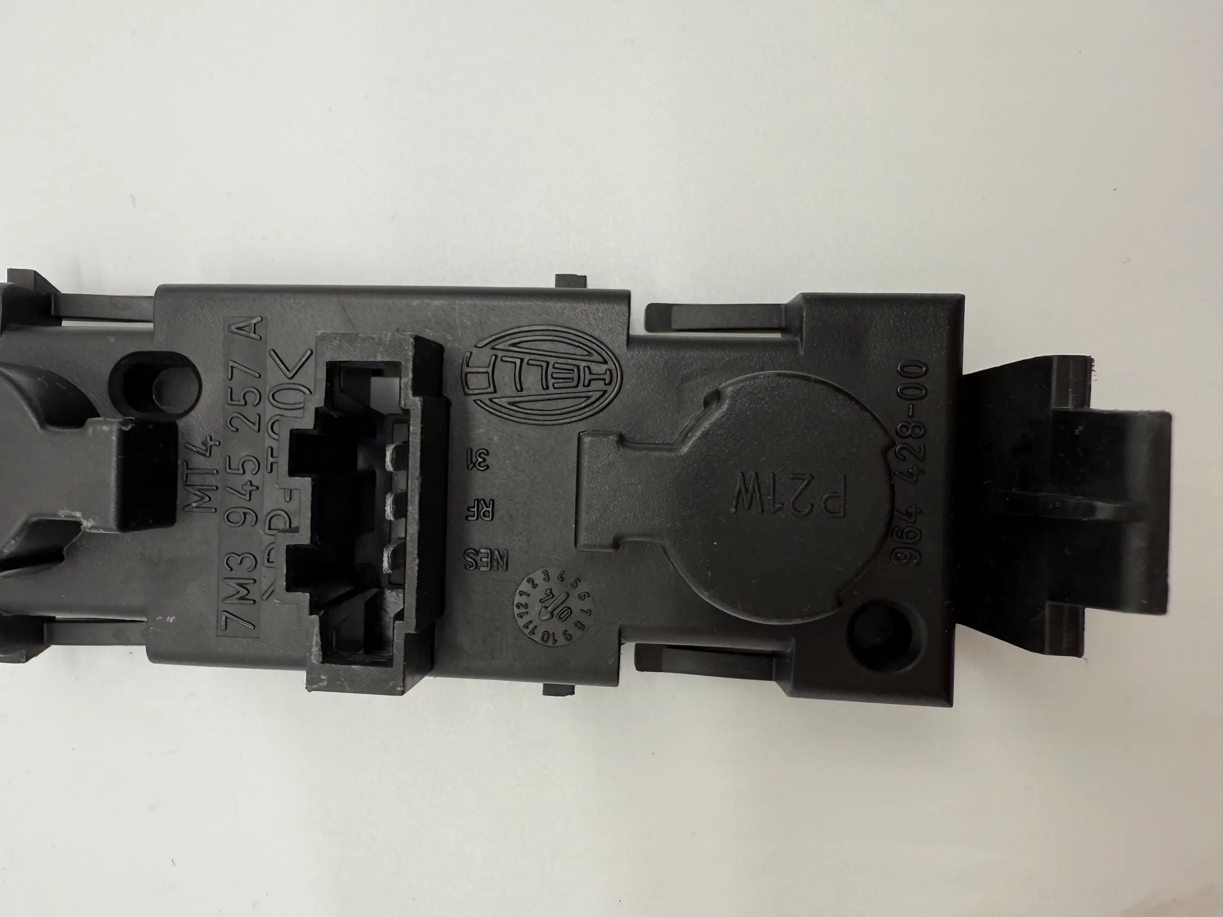 Oryginalny uchwyt lampy tylnej VW Sharan Ford Galaxy, Alhambra L/P 7M3945257A