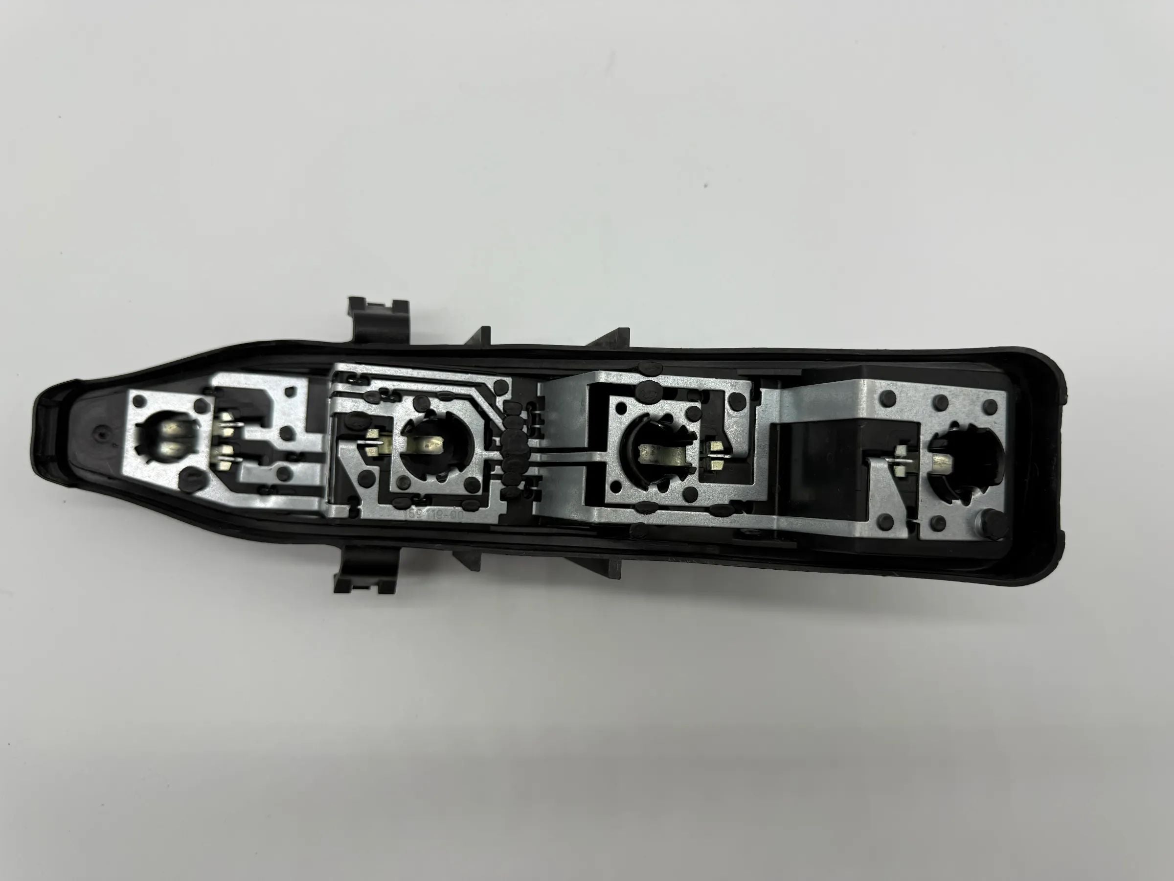 Oryginalny Renault Grand Scenic (JM0/1) uchwyt lampy tylnej L/P 15311300