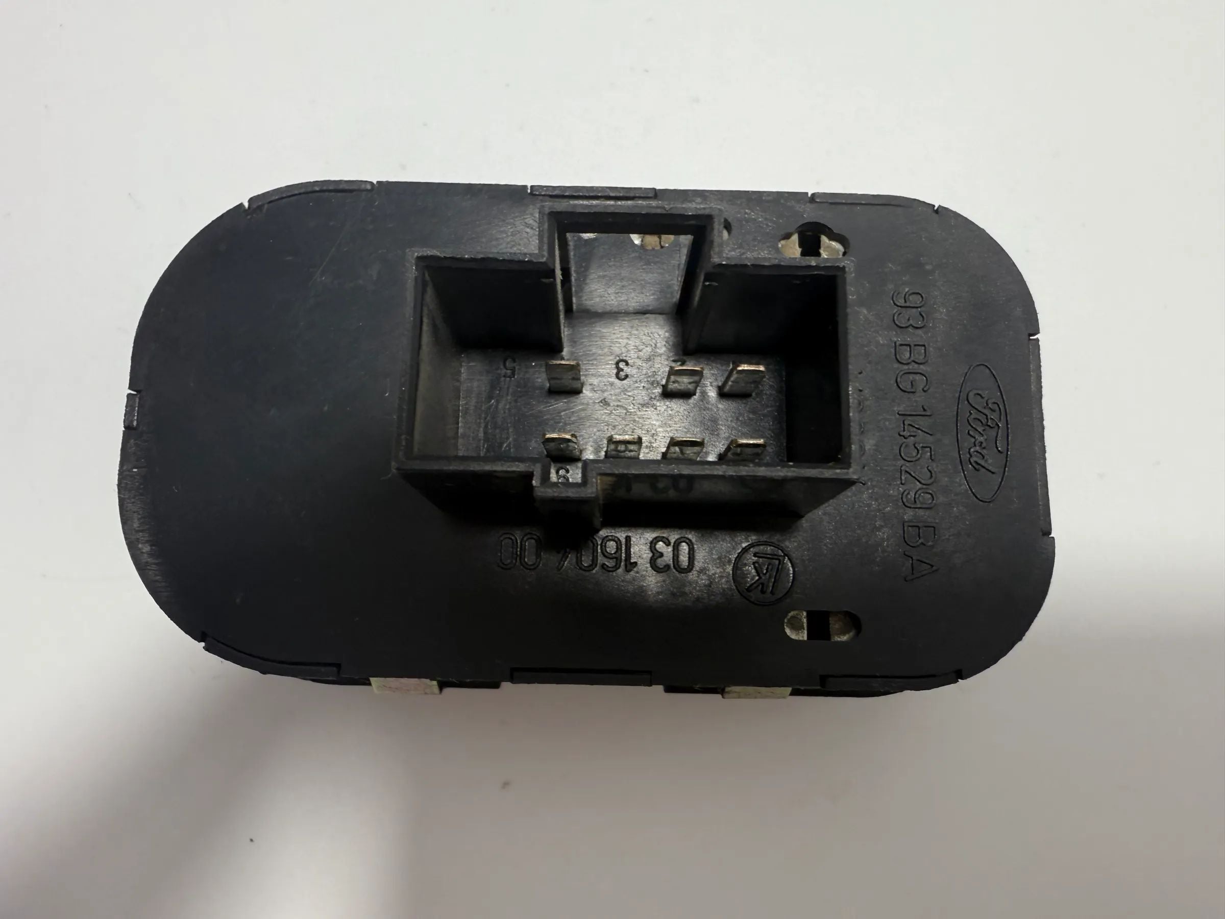 Oryginalny przełącznik podnośnika szyby lewy Ford Mondeo I / II 93BG14529BA / 03160400