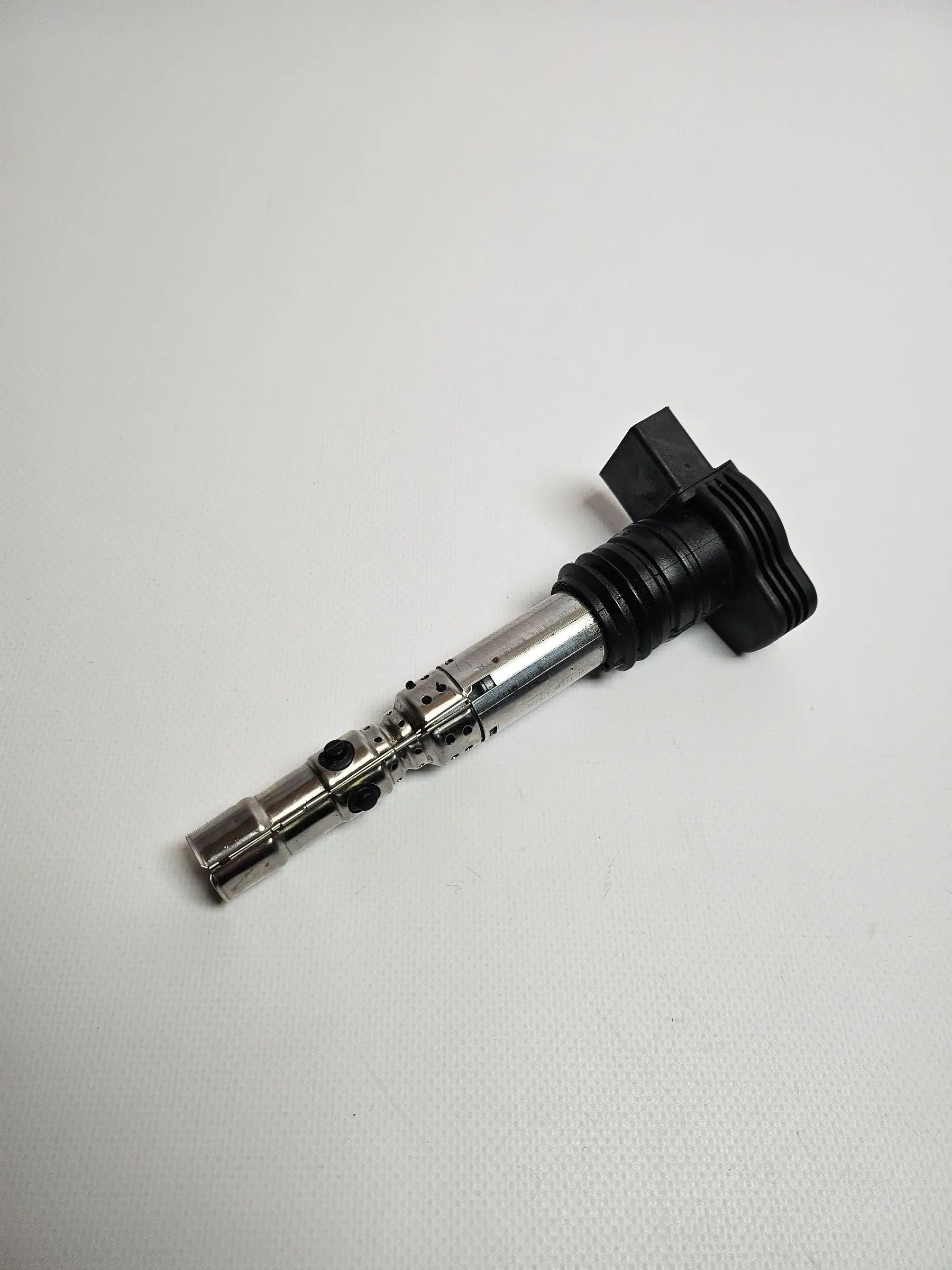 Oryginalna cewka zapłonowa VW PASSAT B5+ 3BG 2002 1,8 Benzyna 06A905115D