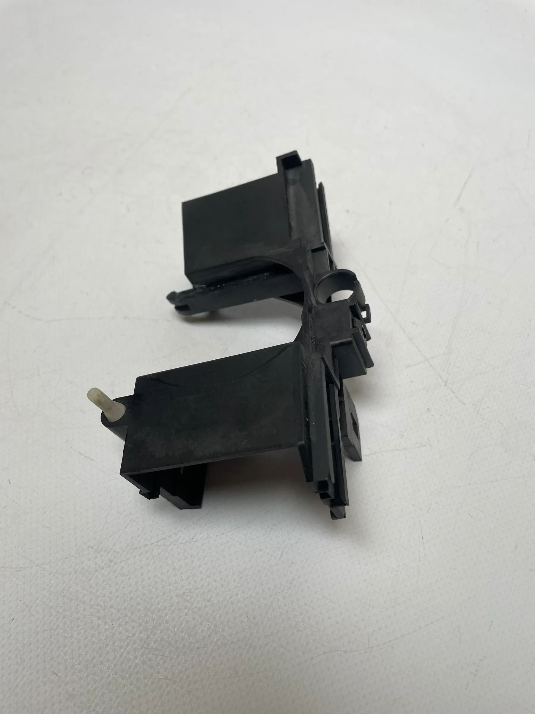 Oryginalny BMW 5er (E39) uchwyt przełącznika kolumny kierownicy 1162088
