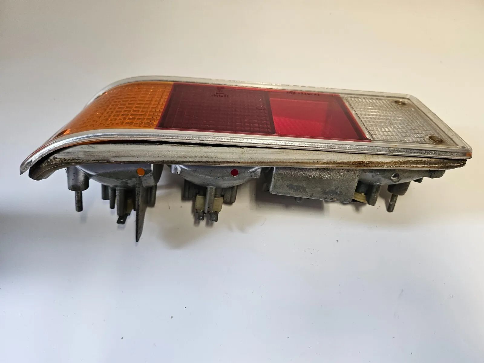 อะไหล่แท้ ไฟท้ายซ้าย Hella Opel Rekord D 1977-1983 DGM9725PR