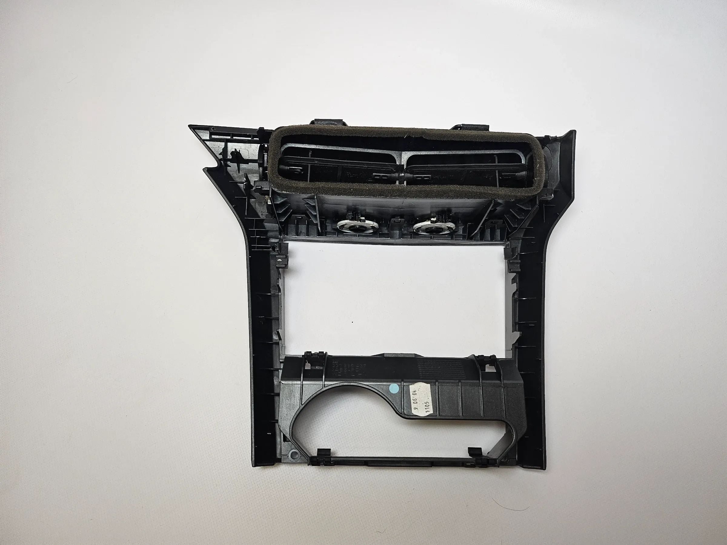 Oryginalna osłona kratki nawiewu środkowego Opel Astra H 331985437