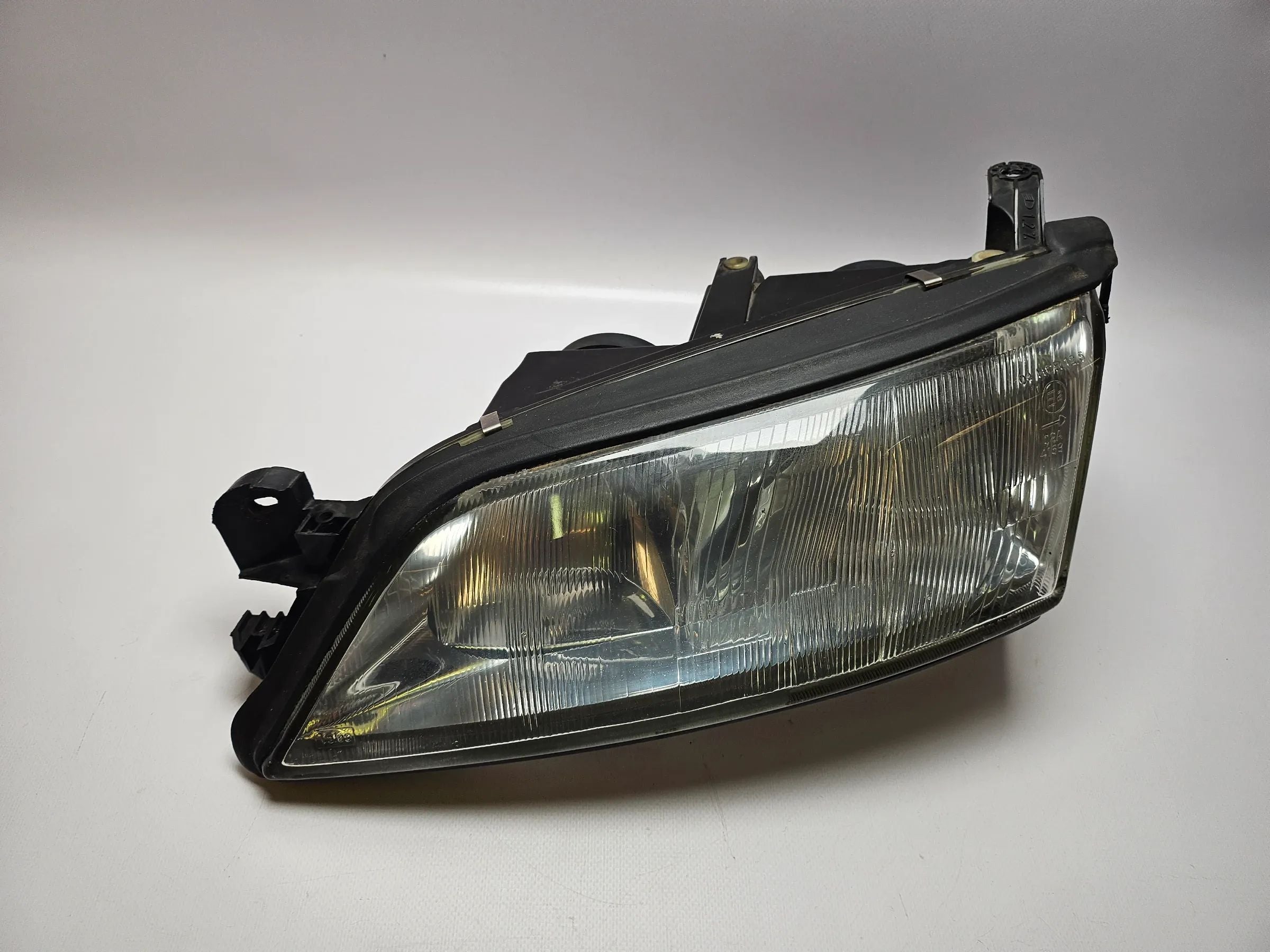 Óptica izquierda original Opel Vectra B ´97, Valeo con regulación de altura 88201726