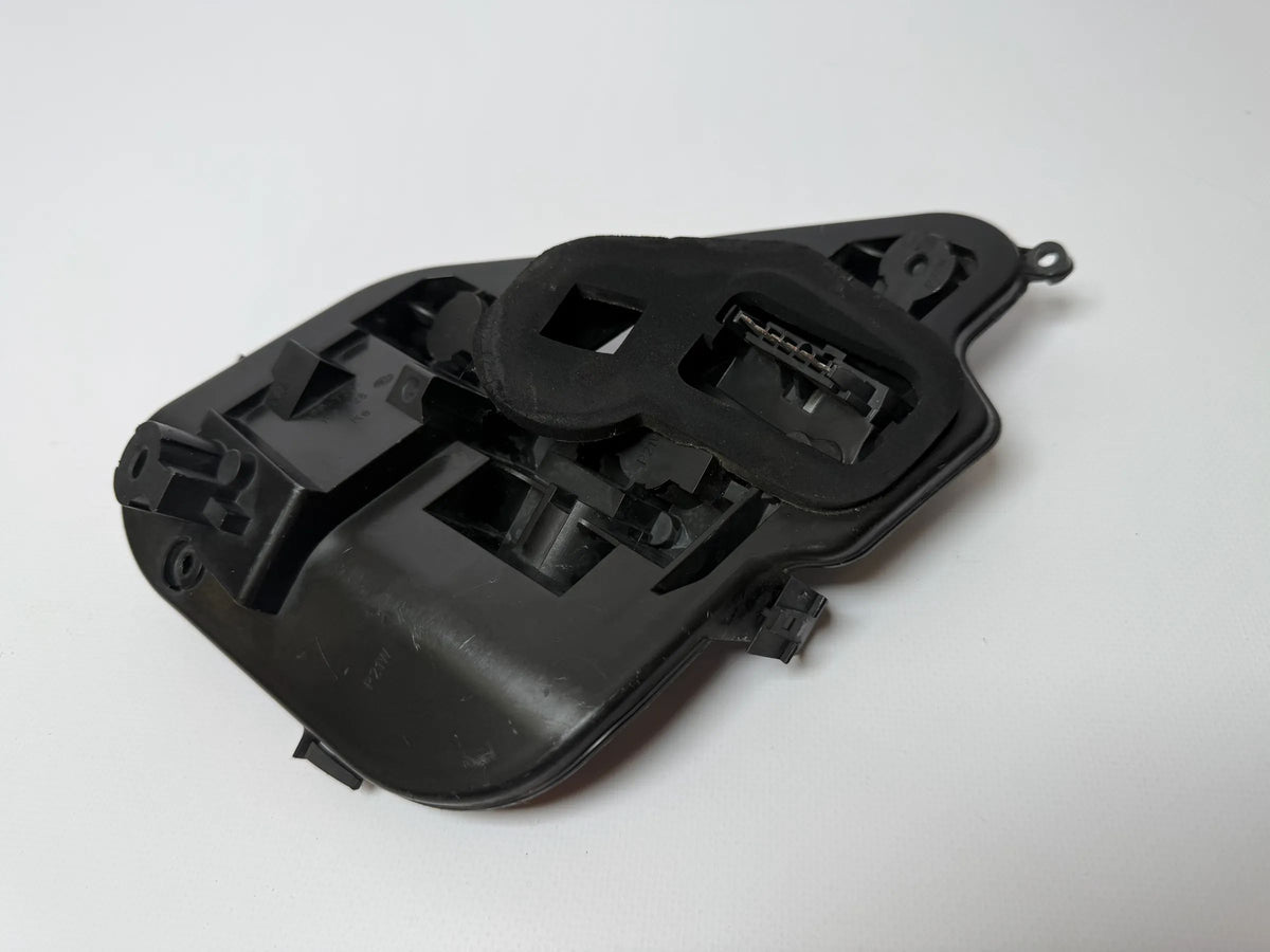 Oryginalny uchwyt lampy tylnej Opel Astra H (A04) Hella 160916-00 / 159728
