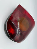 Original Renault Twingo I (C06) rear light left Carello 7700820013 