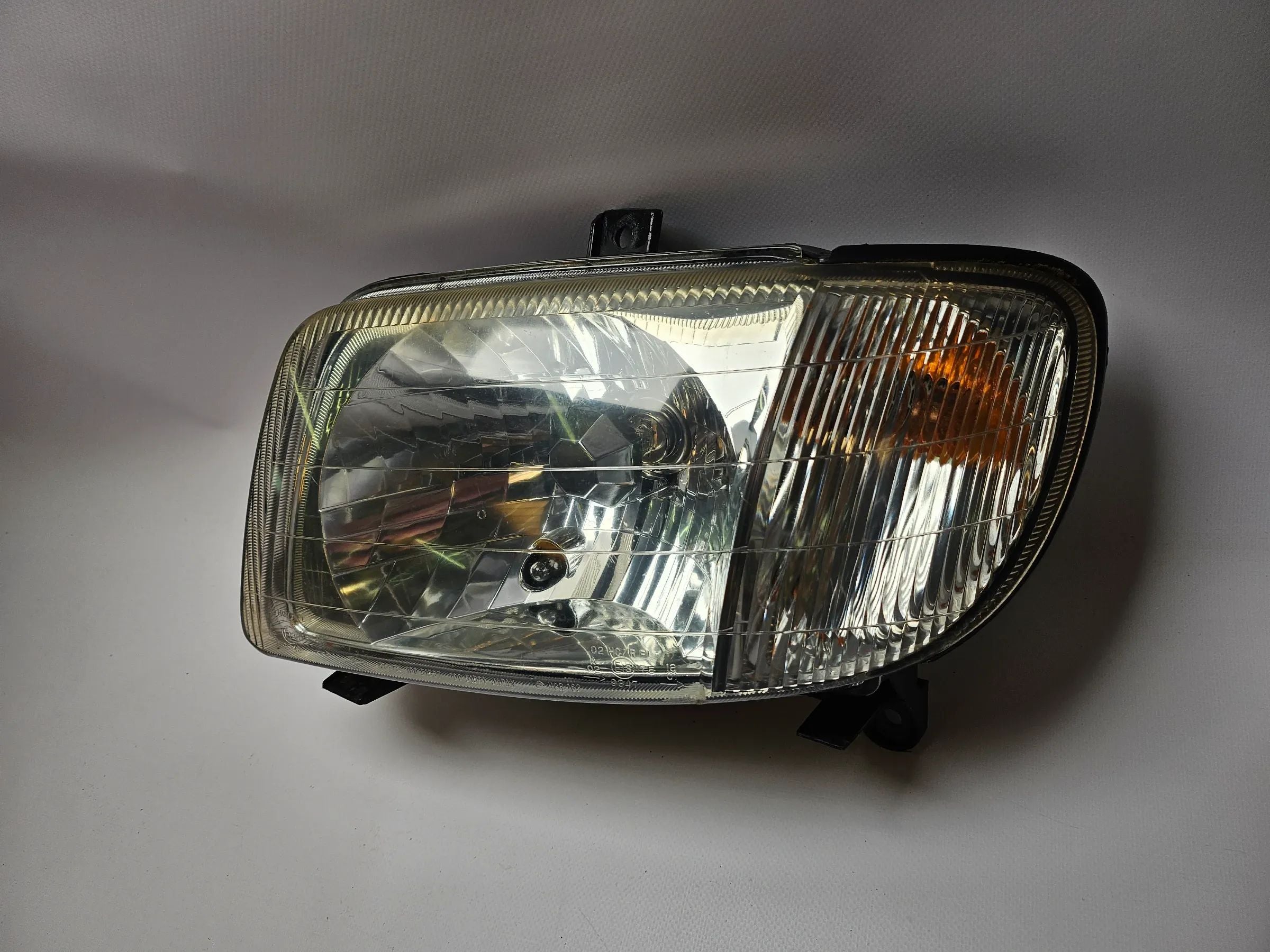 Faro Original Delantero Izquierdo Daihatsu Cuore L701 L7 100-51587