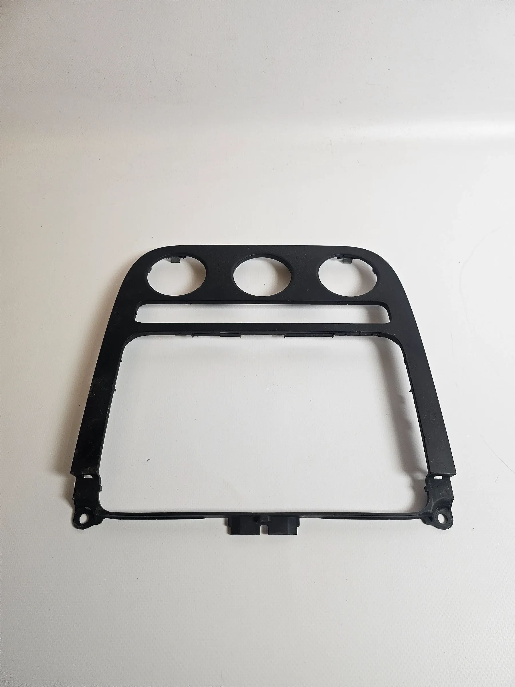 Oryginalna osłona konsoli środkowej radia i ogrzewania VW Golf V 1K 1K0858071A