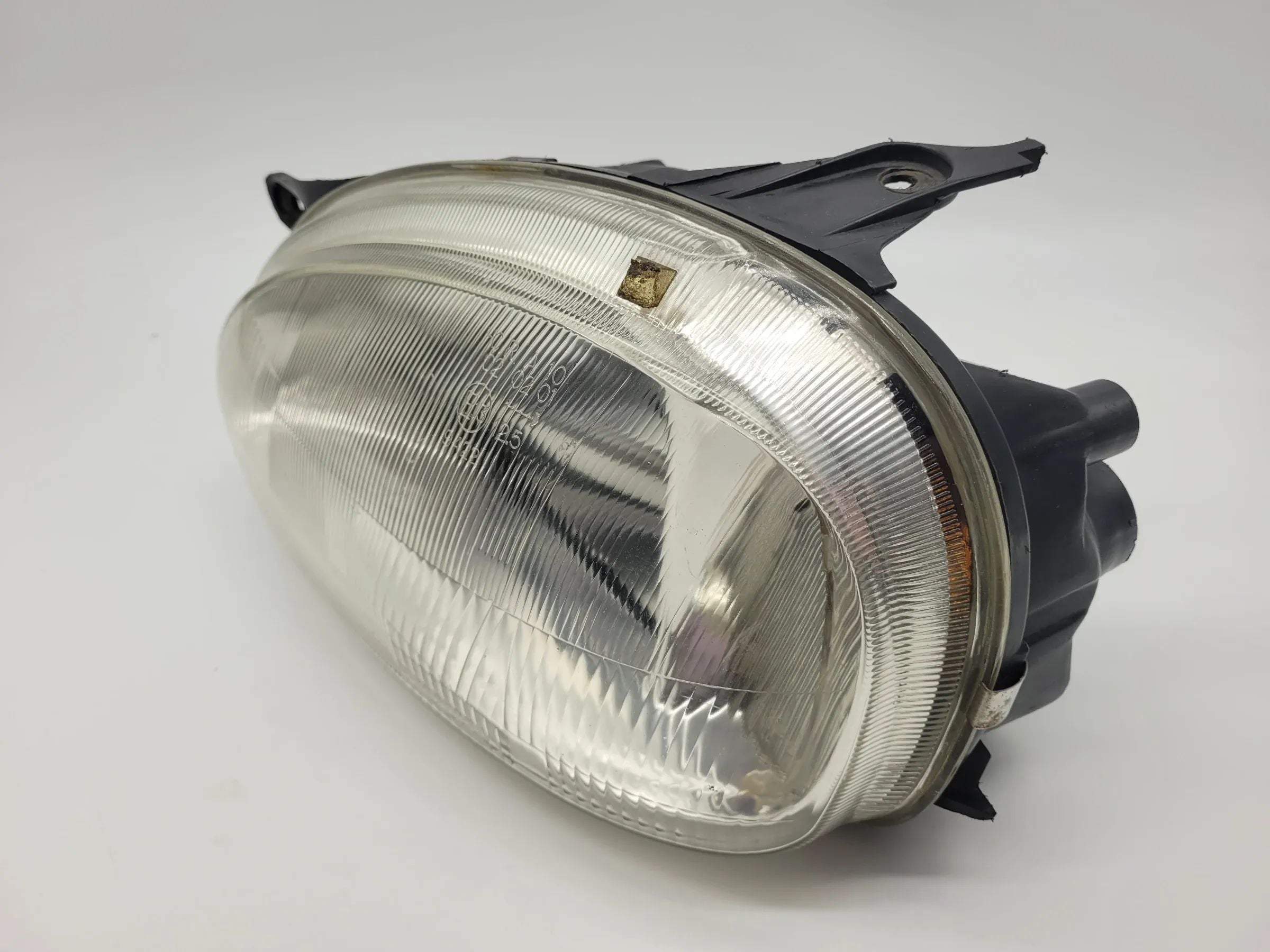 Opel Corsa B (S93) Scheinwerfer / Frontleuchte Links 20-3204 (90444784)