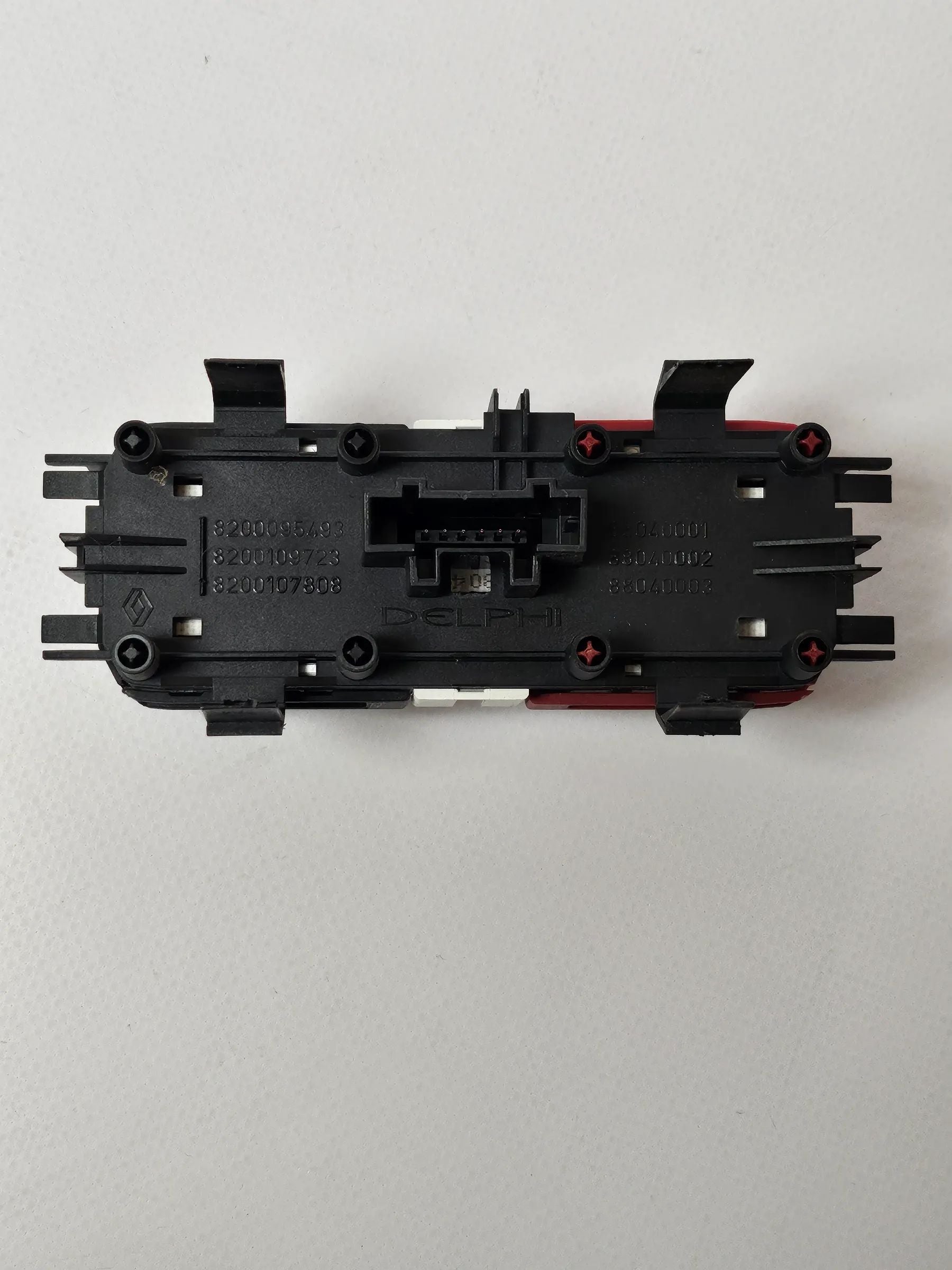 Oryginalny przełącznik świateł awaryjnych Renault Scenic II 8200095493