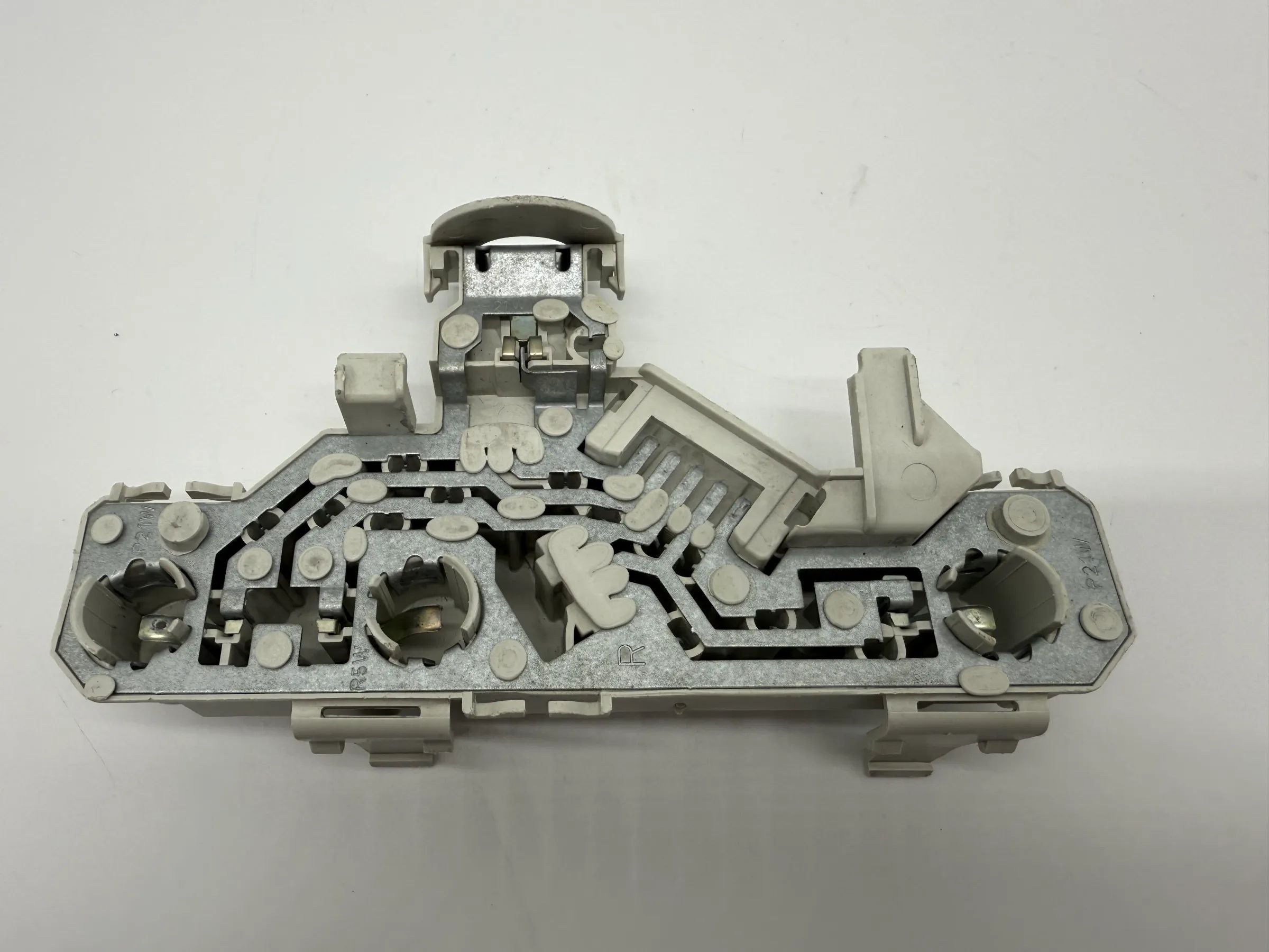 Oryginalny uchwyt lampy tylnej prawej VW Polo (6N) Hella 6N09452589A / 962566