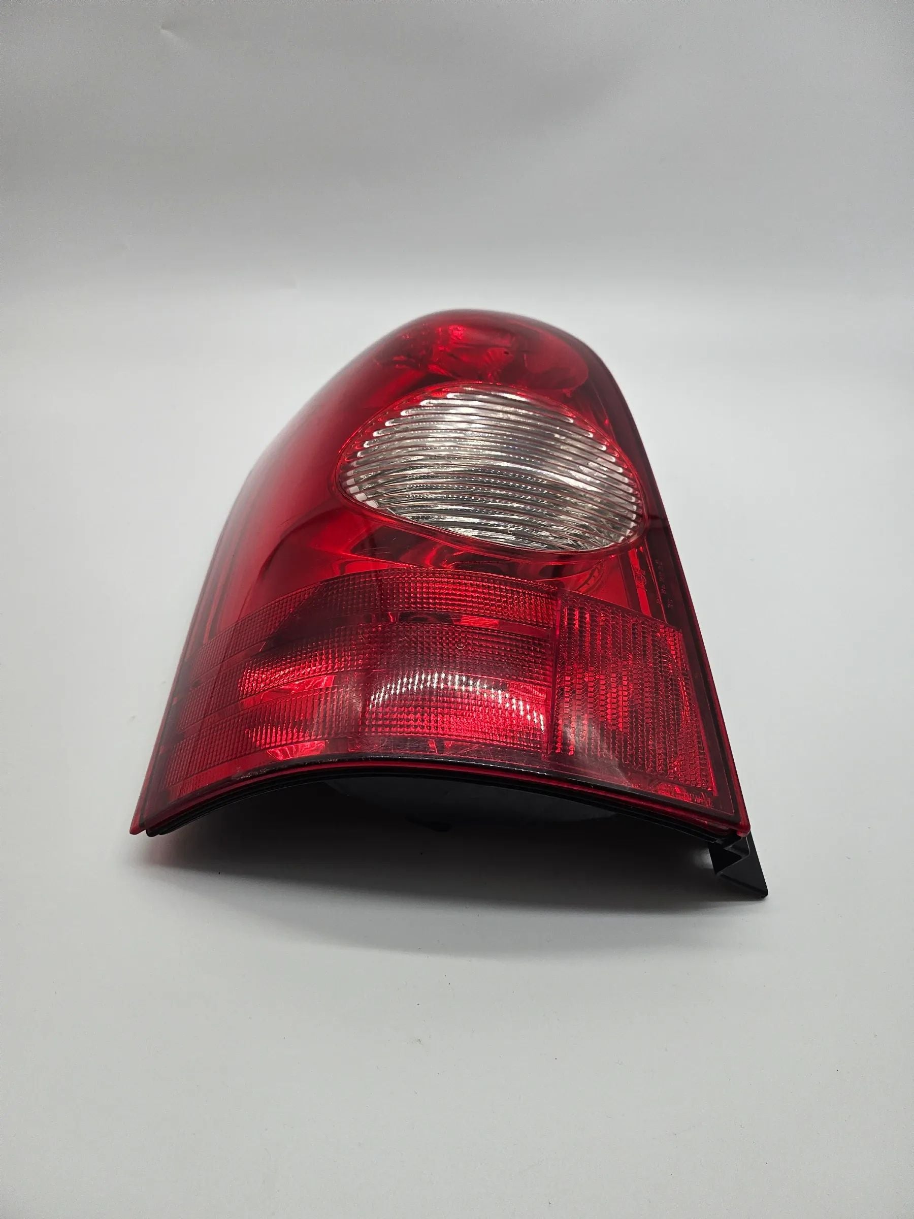 Oryginalne lewe tylne światło MAZDA MPV II (LW) 05/2002-10/2003