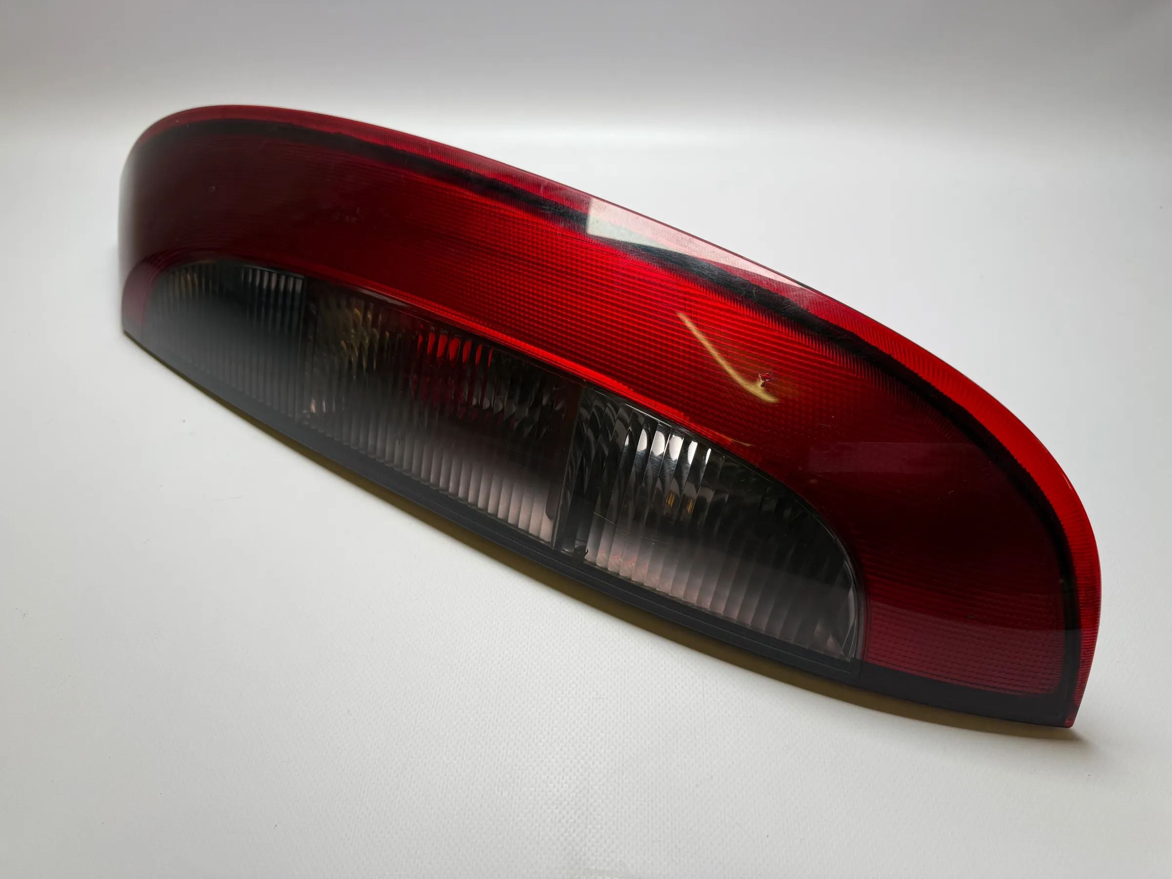 Оригинальный задний правый фонарь Opel Corsa C X01 Valeo 09114337 / 89302181